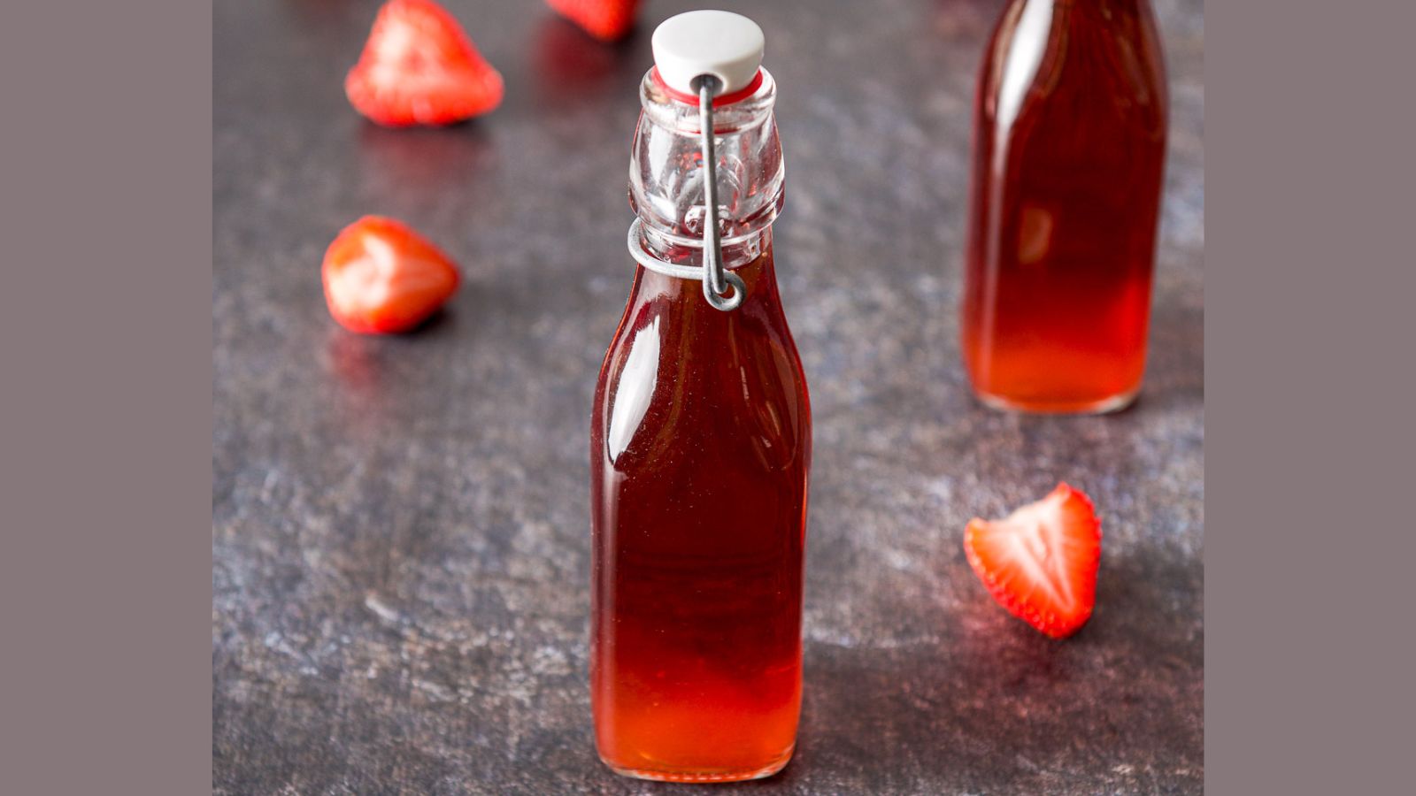 Two bottles of strawberry vodka.