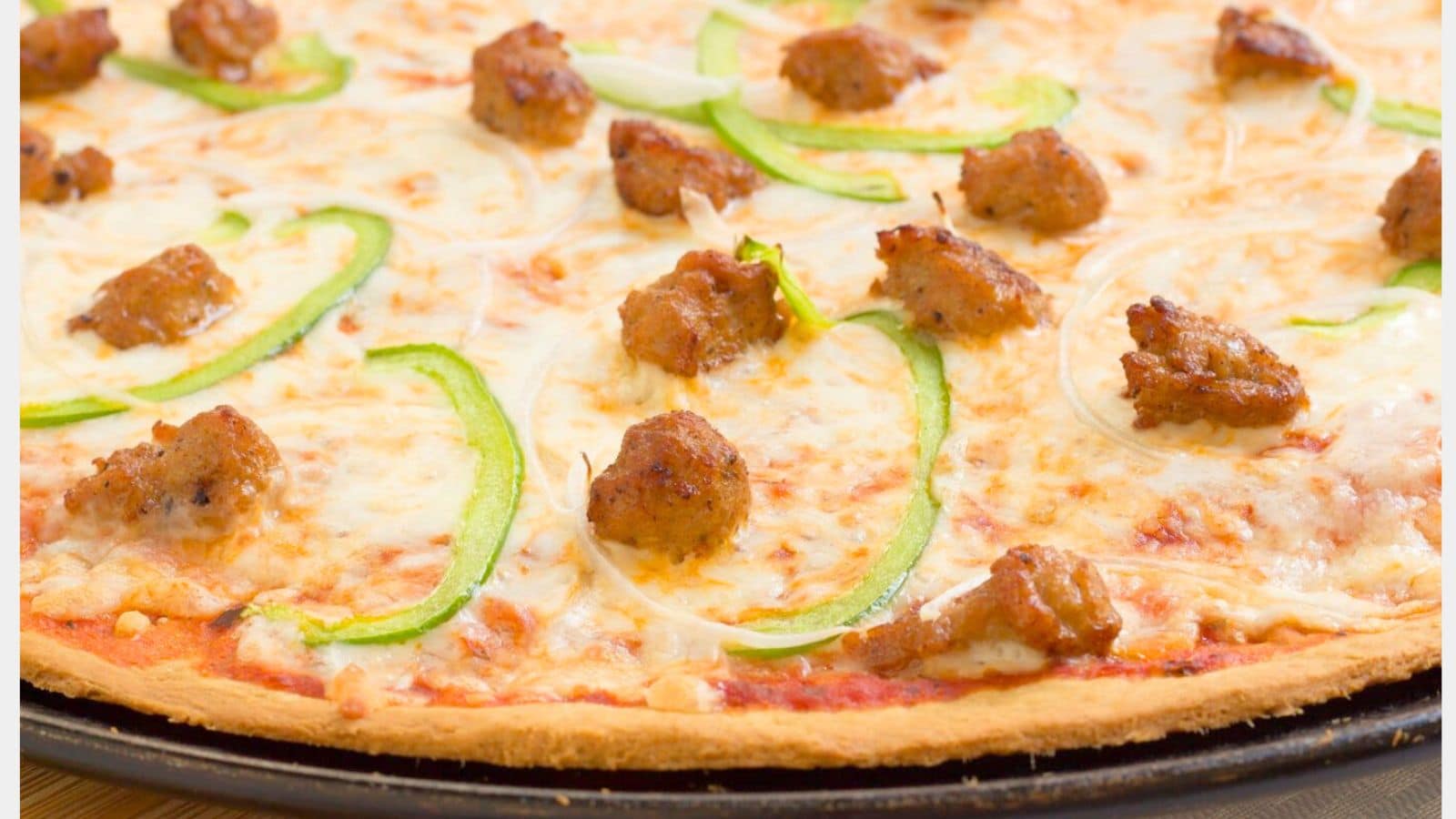 Close up of thin crust pizza.