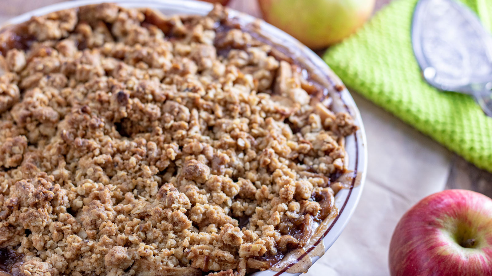 Whole Apple crumb pie. on brown paper.