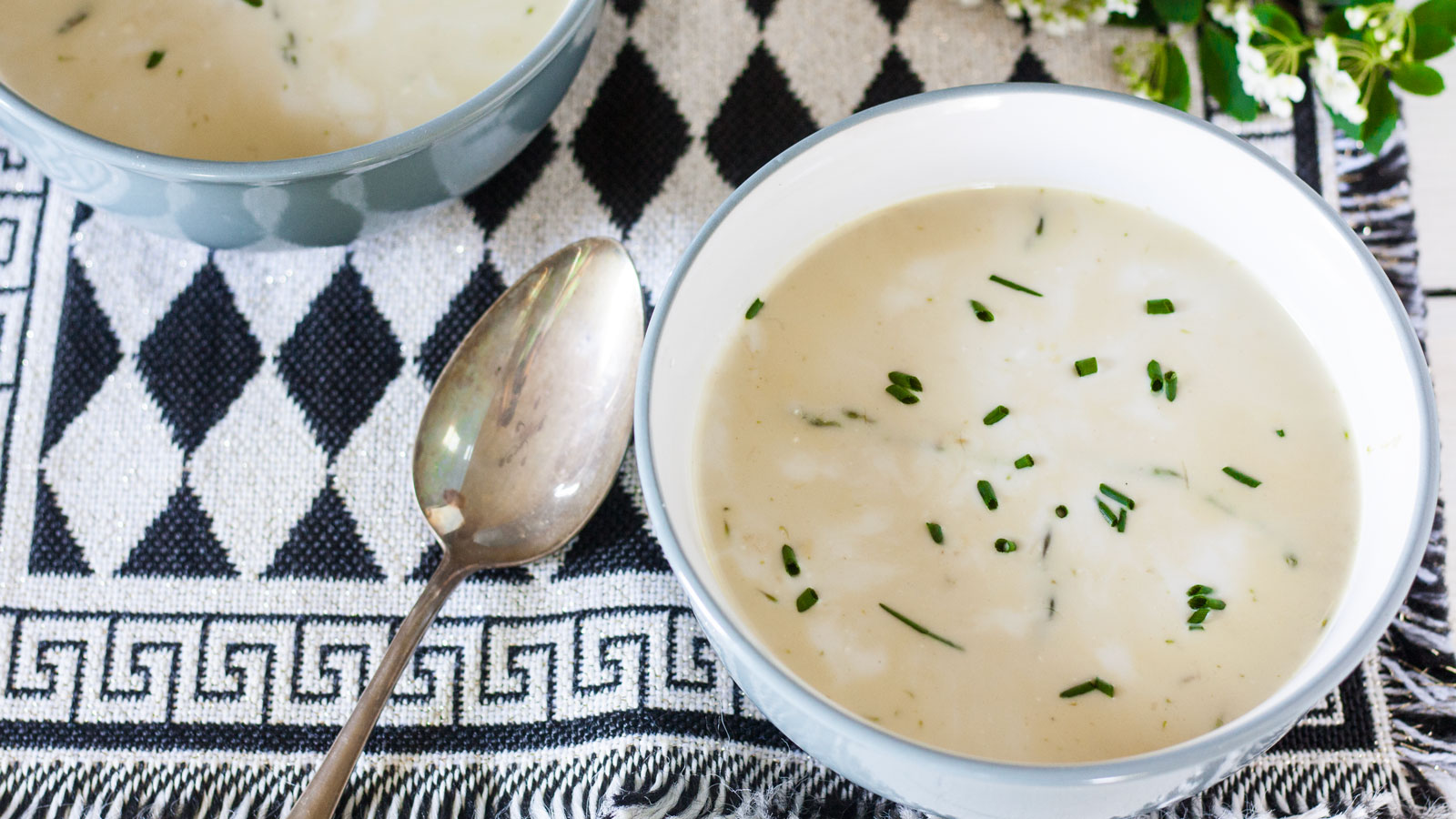 Asparagus soup in blue bowl.