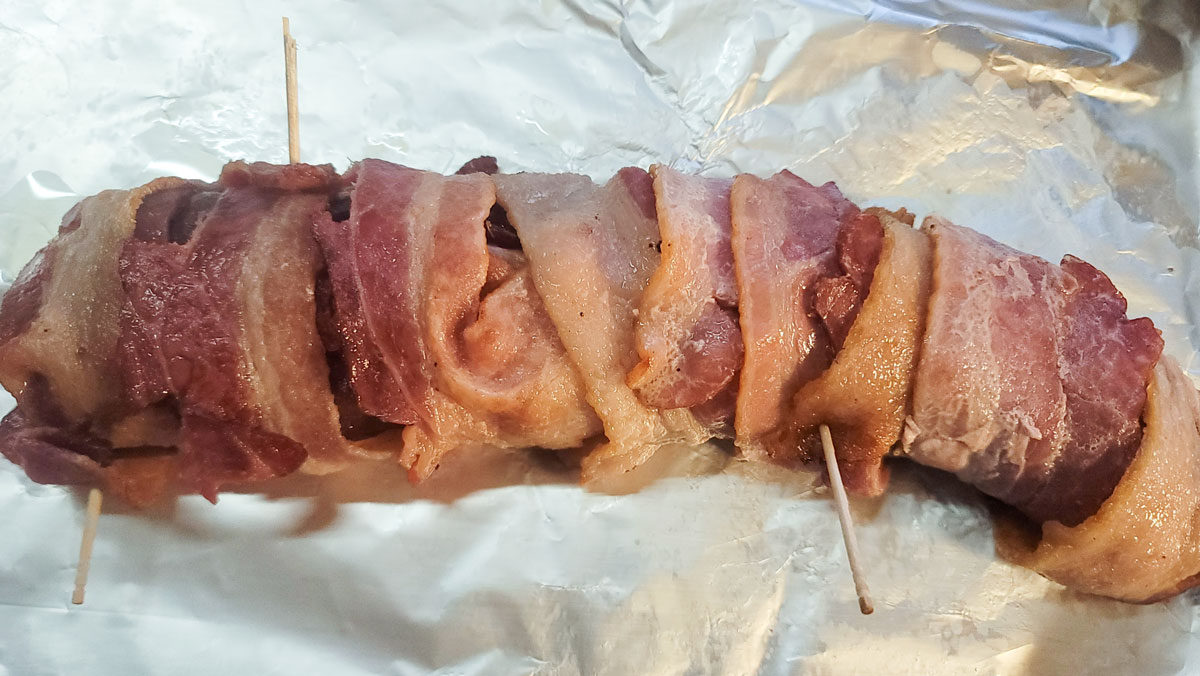 Toothpicks securing the bacon.
