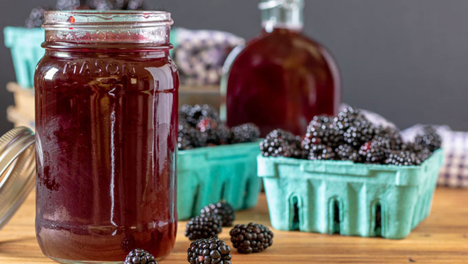 Blackberry simple syrup in canning jar.