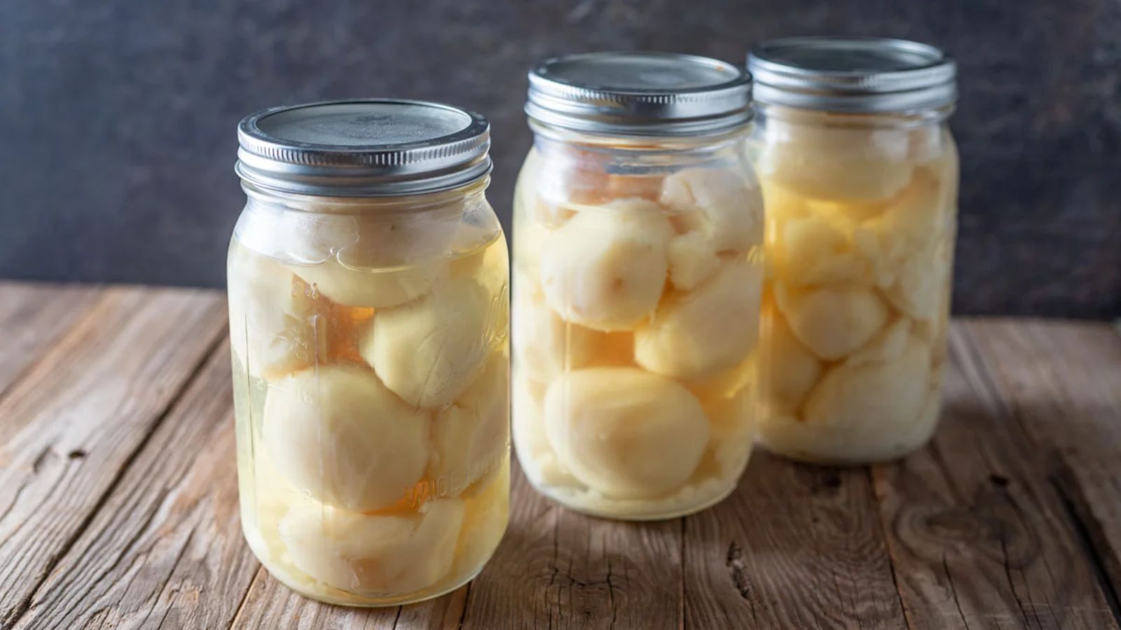 Three cans of potatoes.