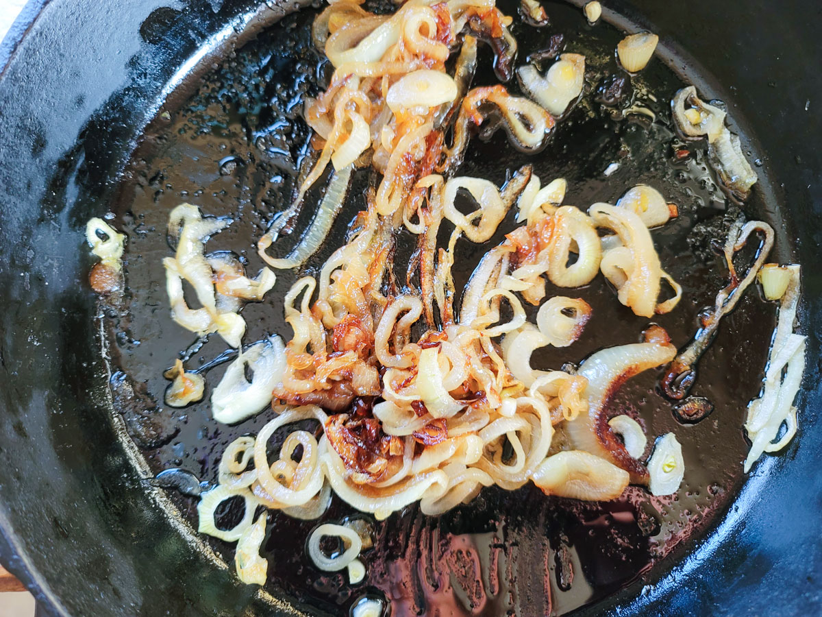 Browned onions in the skillet.