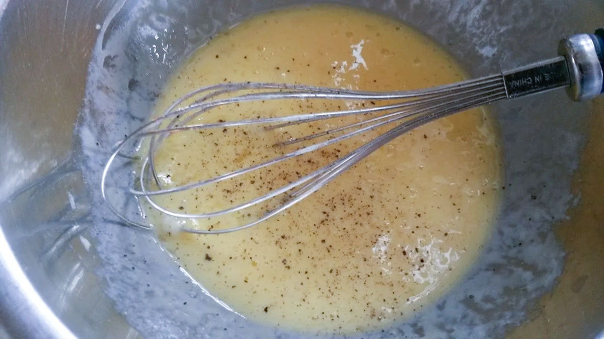 Whisked up eggs with salt and pepper.