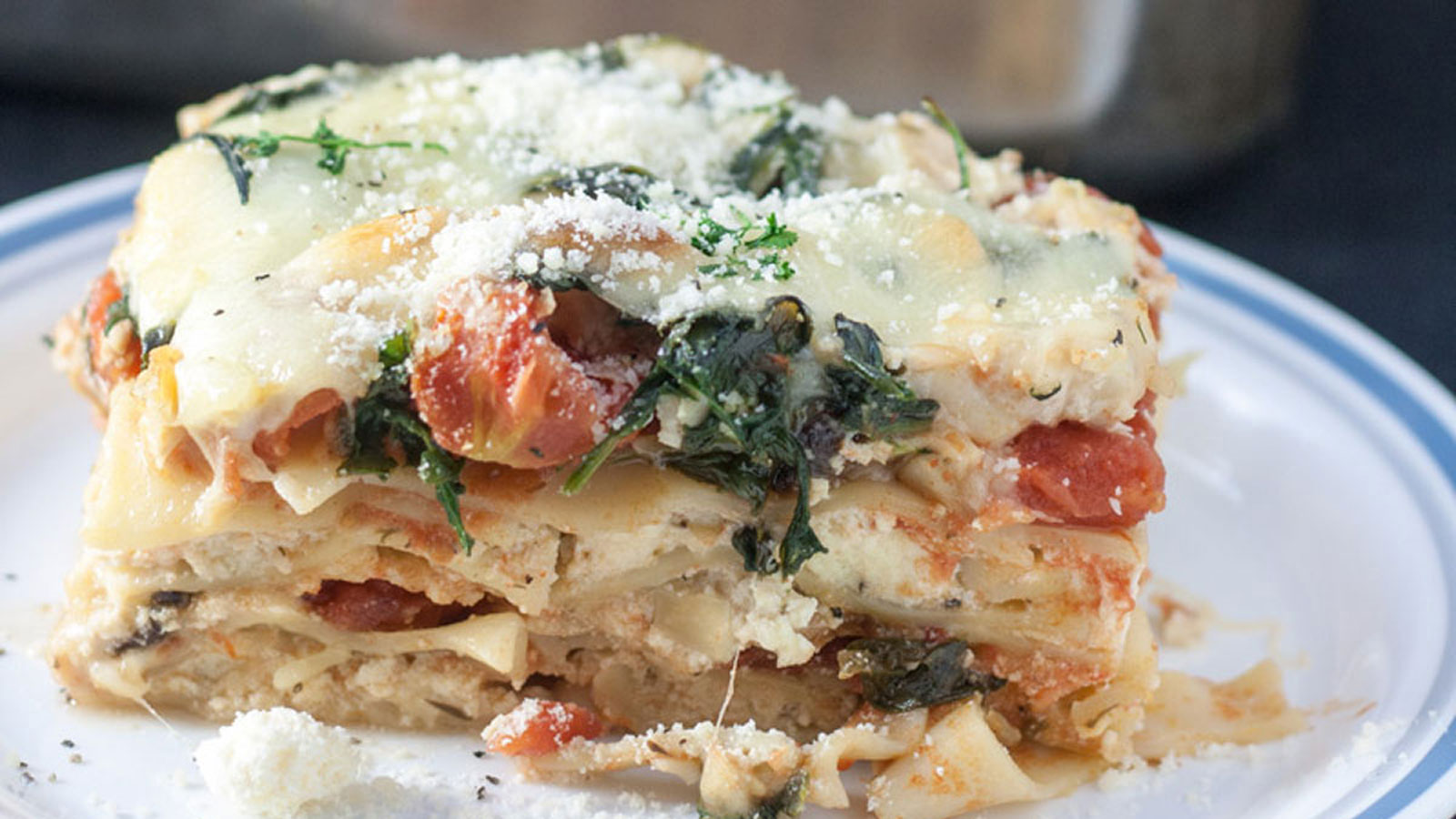 Chicken Lasagna slice on a white plate.