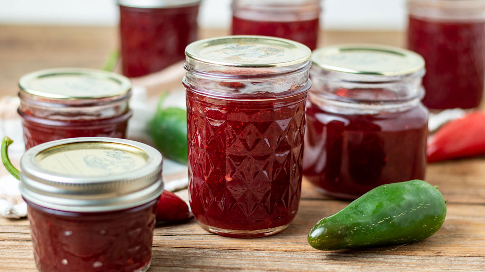 Cranberry pepper jelly in jars with jalape nos
