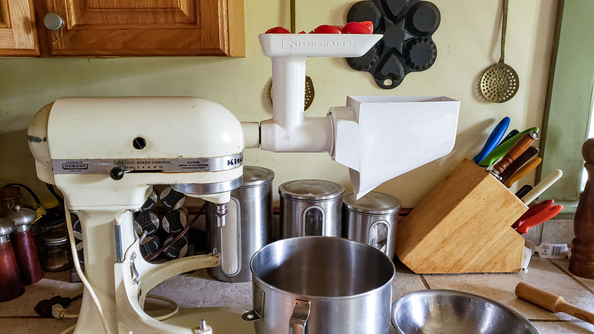 Kitchenaid mixer set up with the juicer attachment.