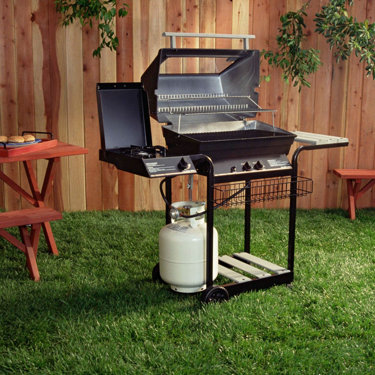 Image of a grill in a backyard.