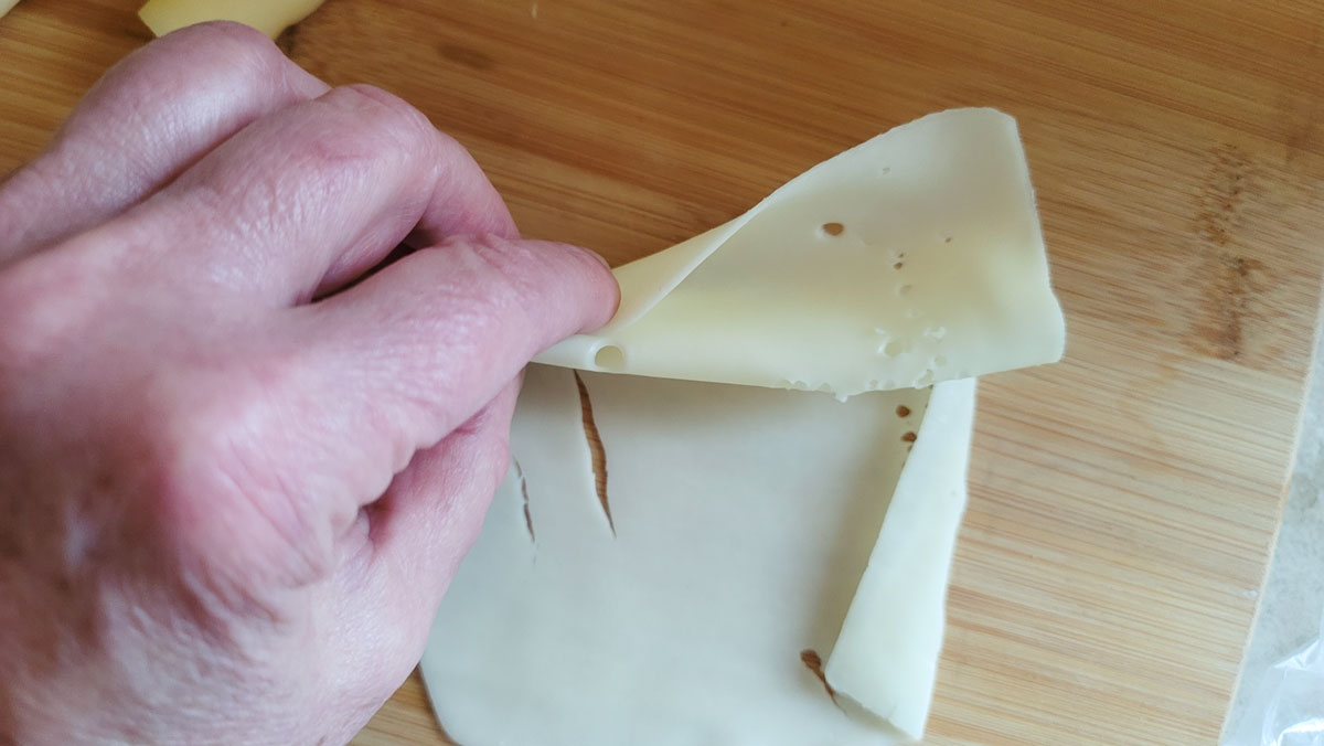 Alternating the folds in the cheese.