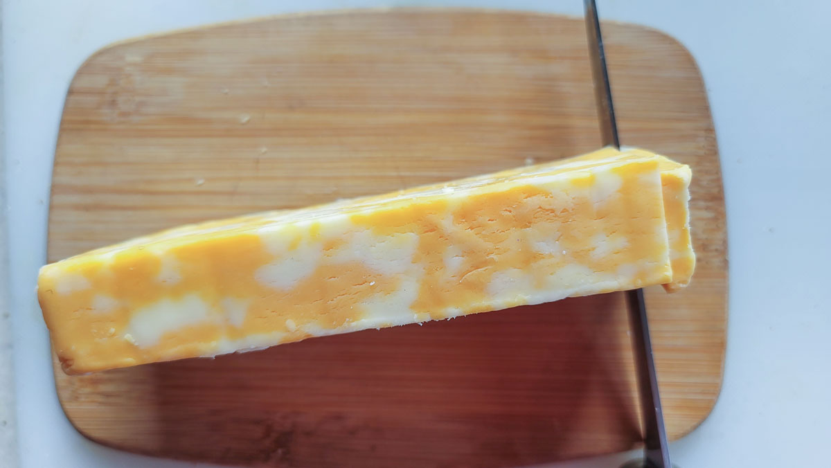 Block of colby jack cheese.