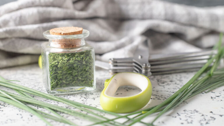 Dehydrated chives in spice jar.