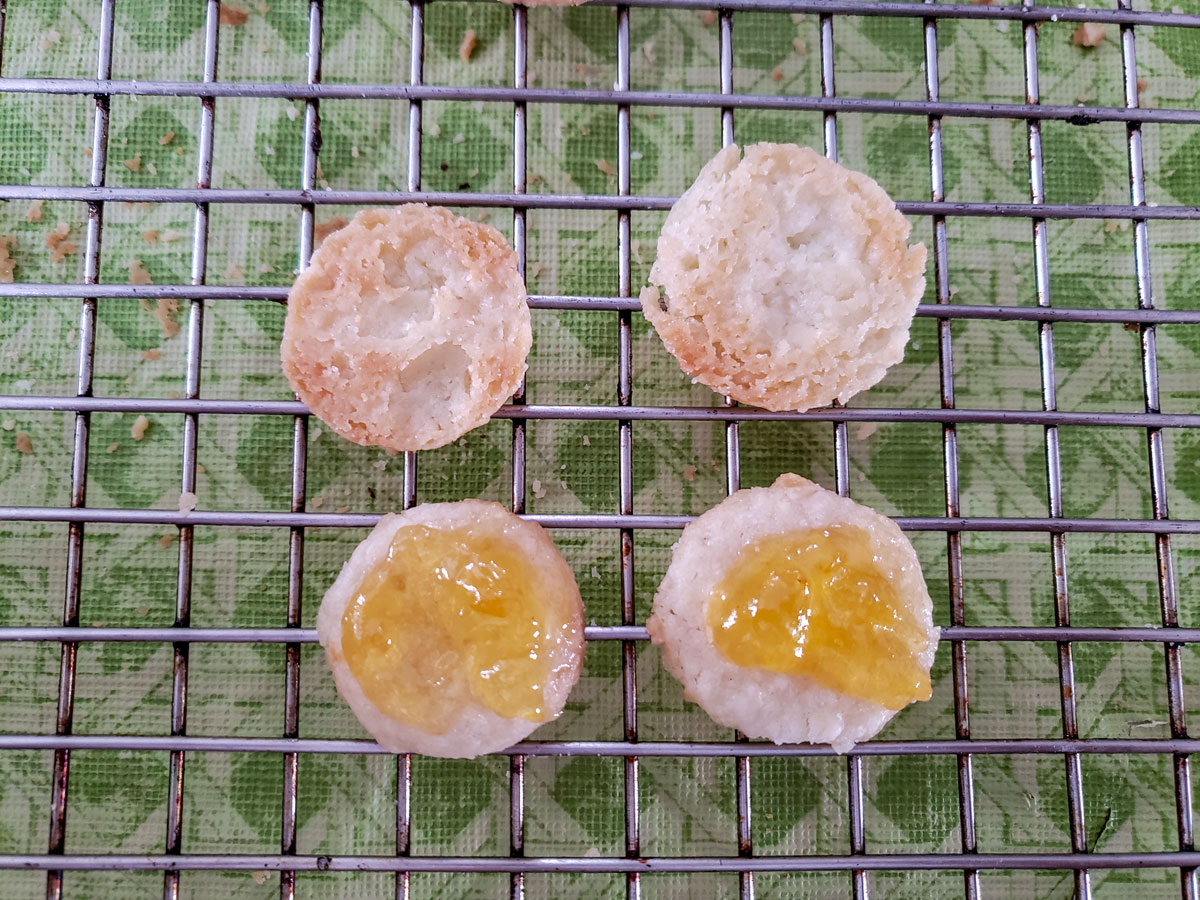Filling cookies with apricot jam.