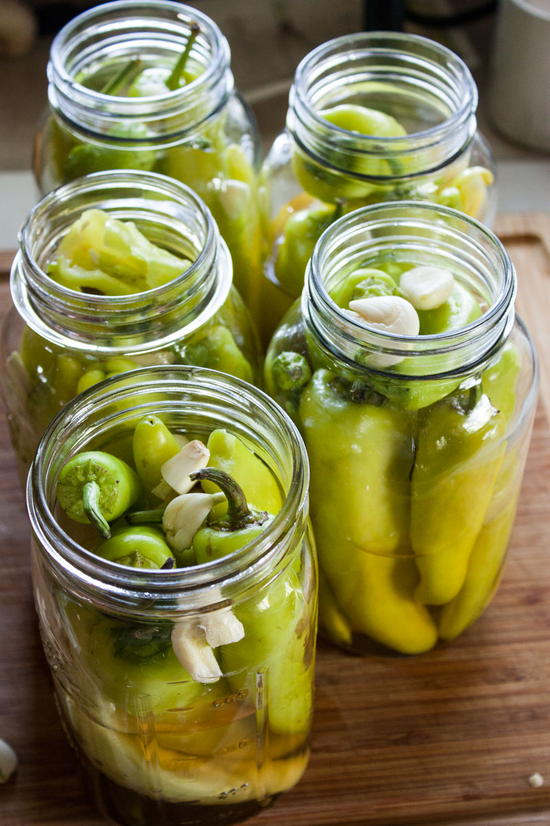 Jars loaded with peppers.