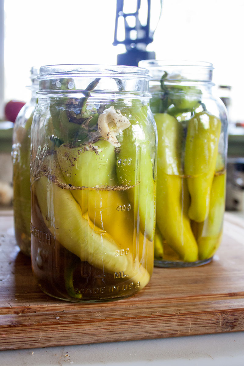 Jar filled half way with vinegar.