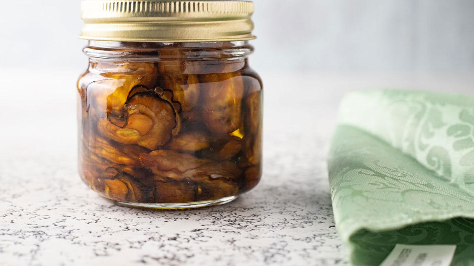 Smoked oysters in a jar.