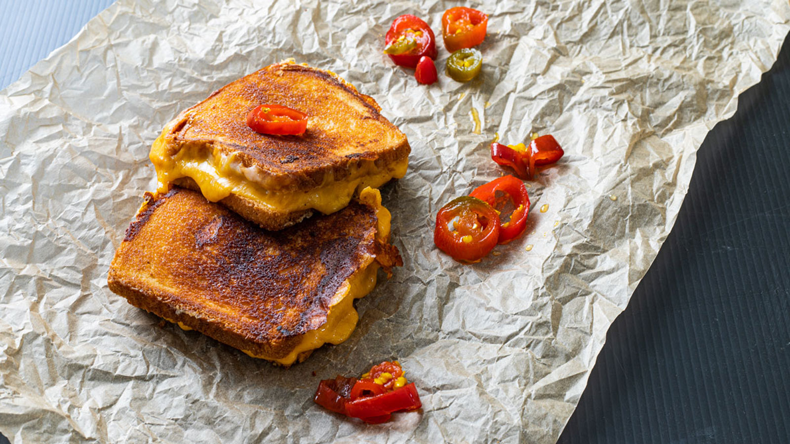 Sandwiches on crumpled paper.