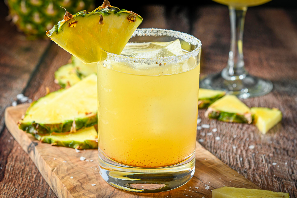 A glass of pineapple margarita.