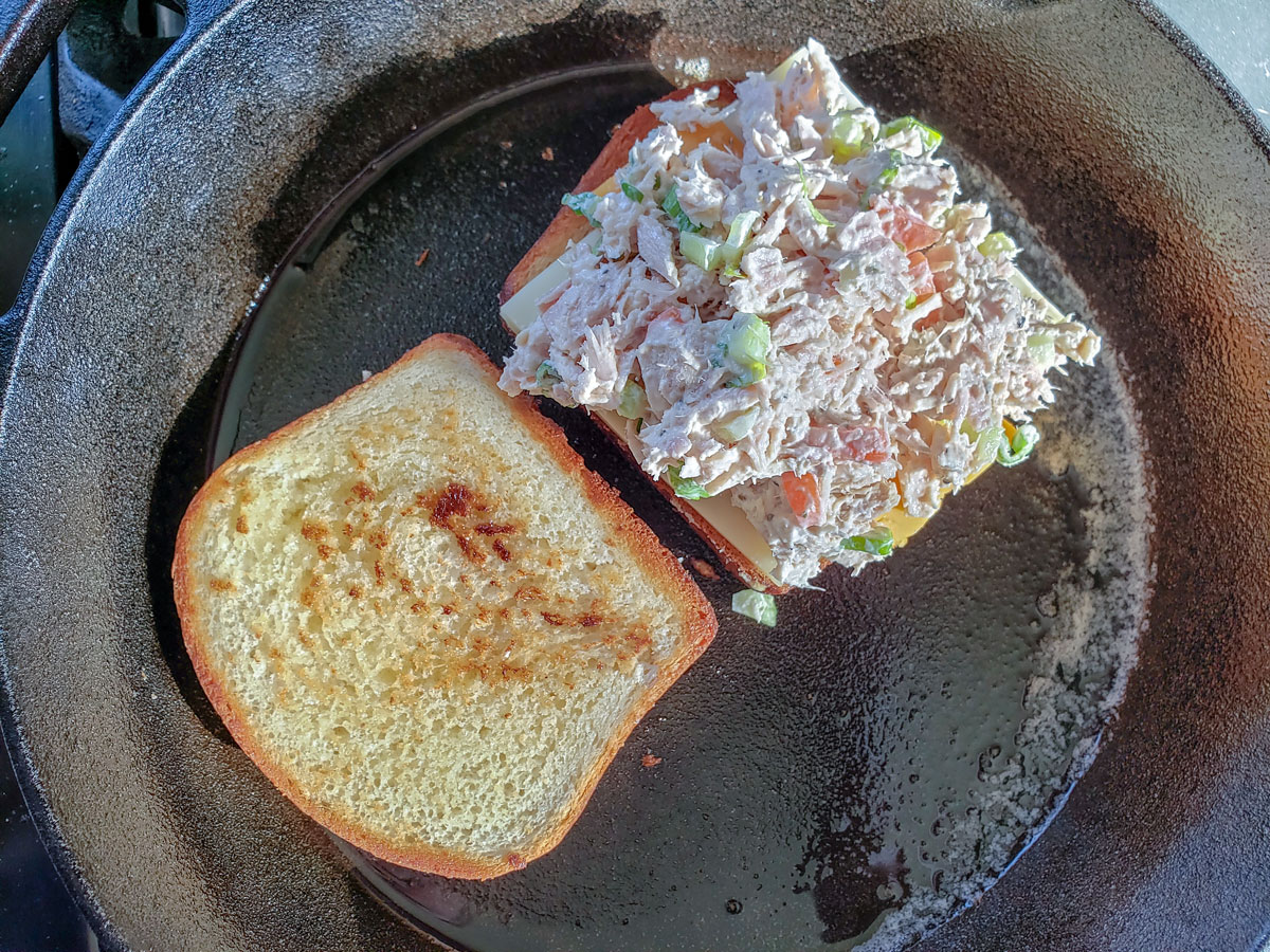 Tuna salad added to the top of the sandwich.