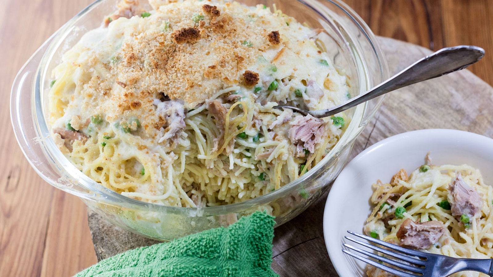 Spaghetti casserole in a bowl and on a plate.