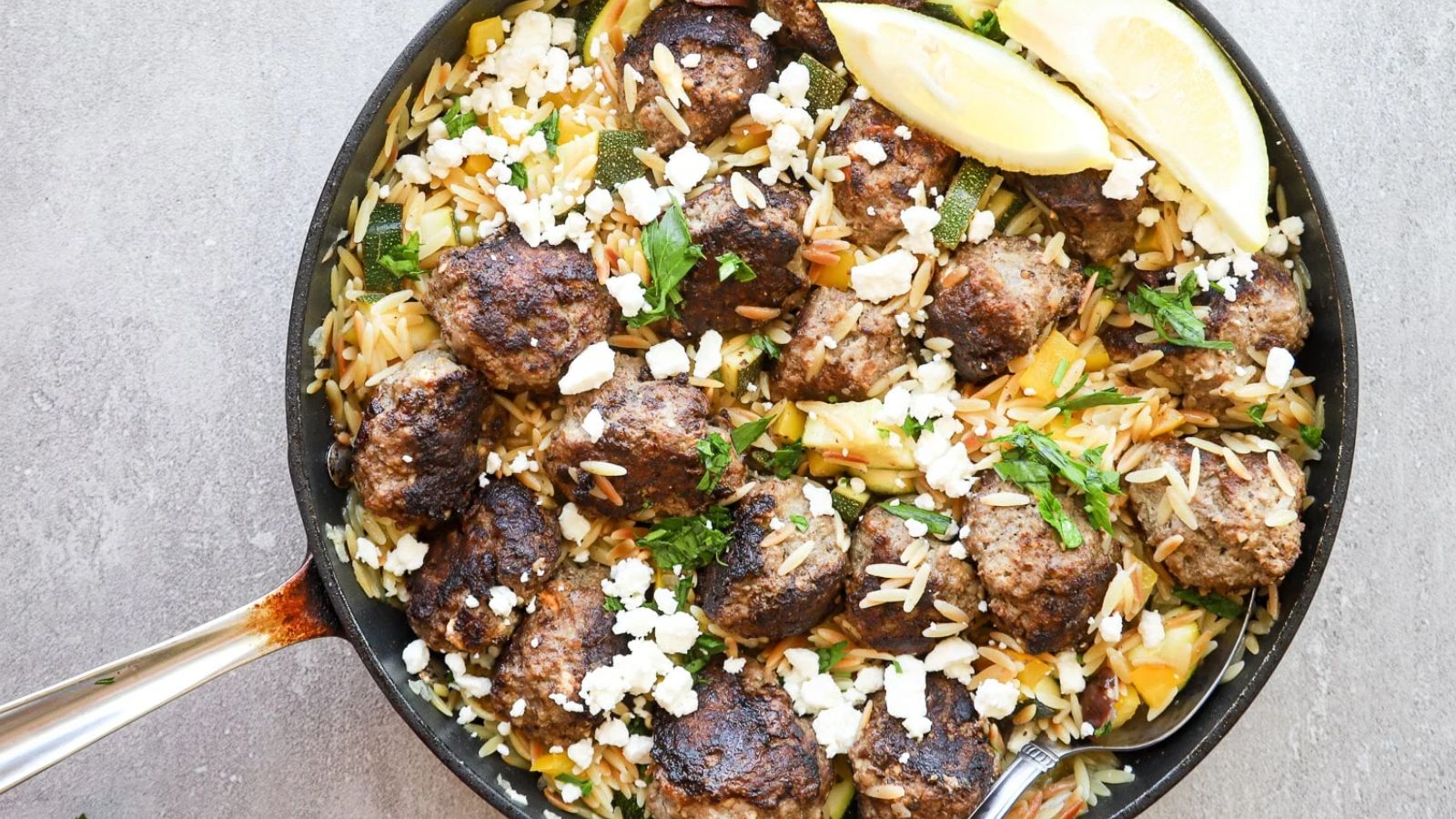 Greek meatball orzo in a pot.