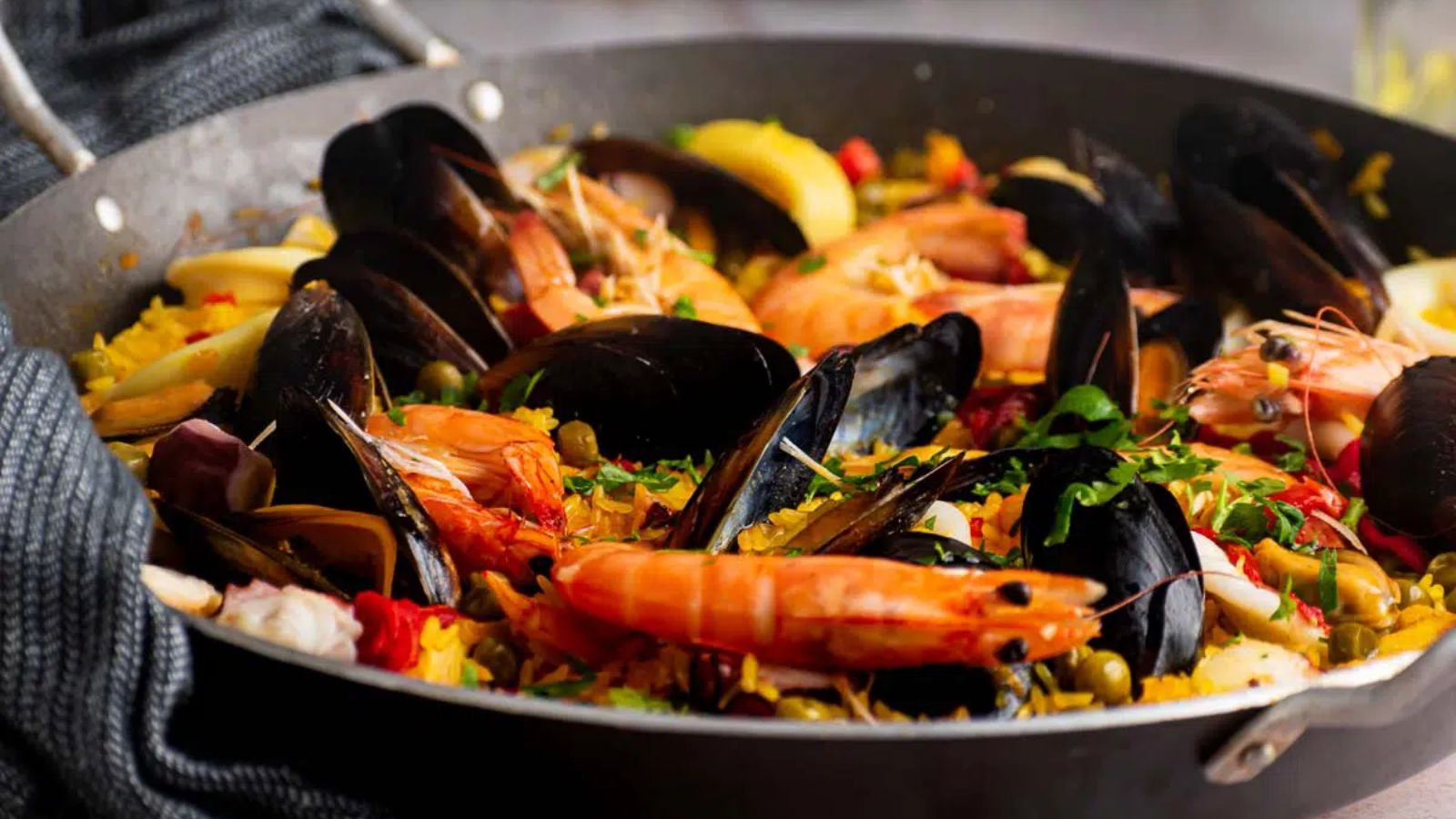 Seafood paella in a pot.