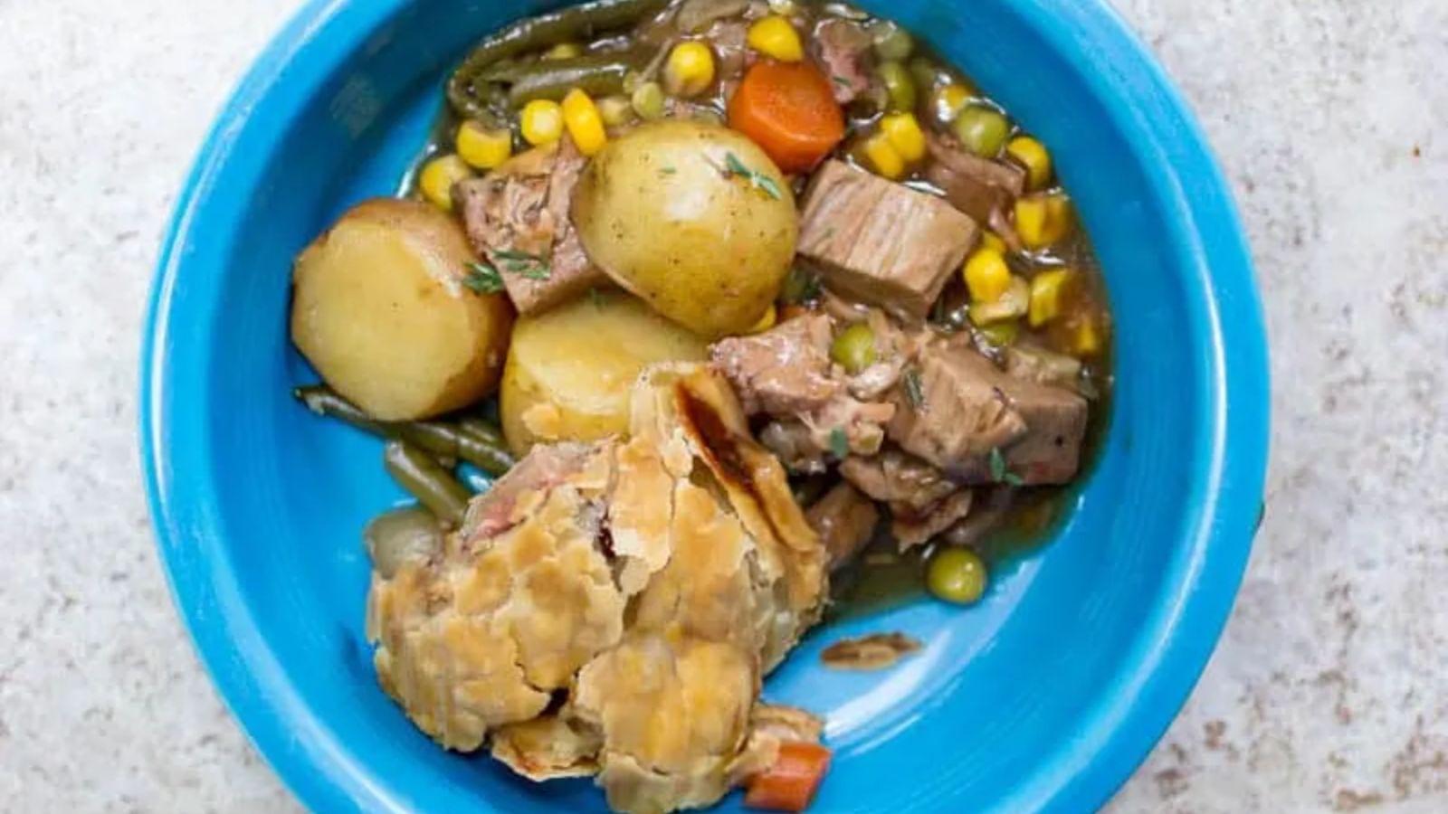 Traeger beef pot pie in a bowl.