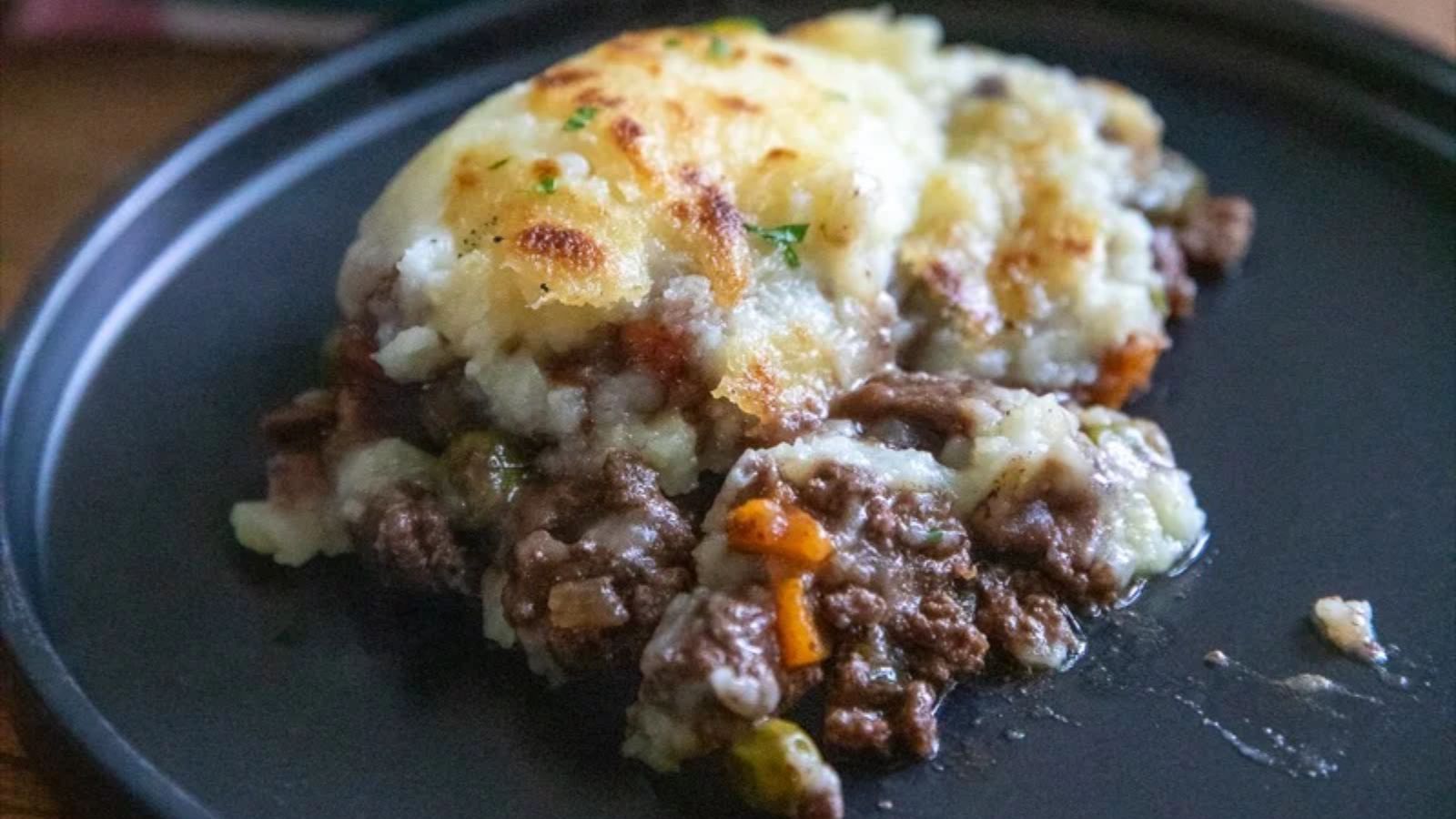 Traeger shepherd pie slice on a plate.