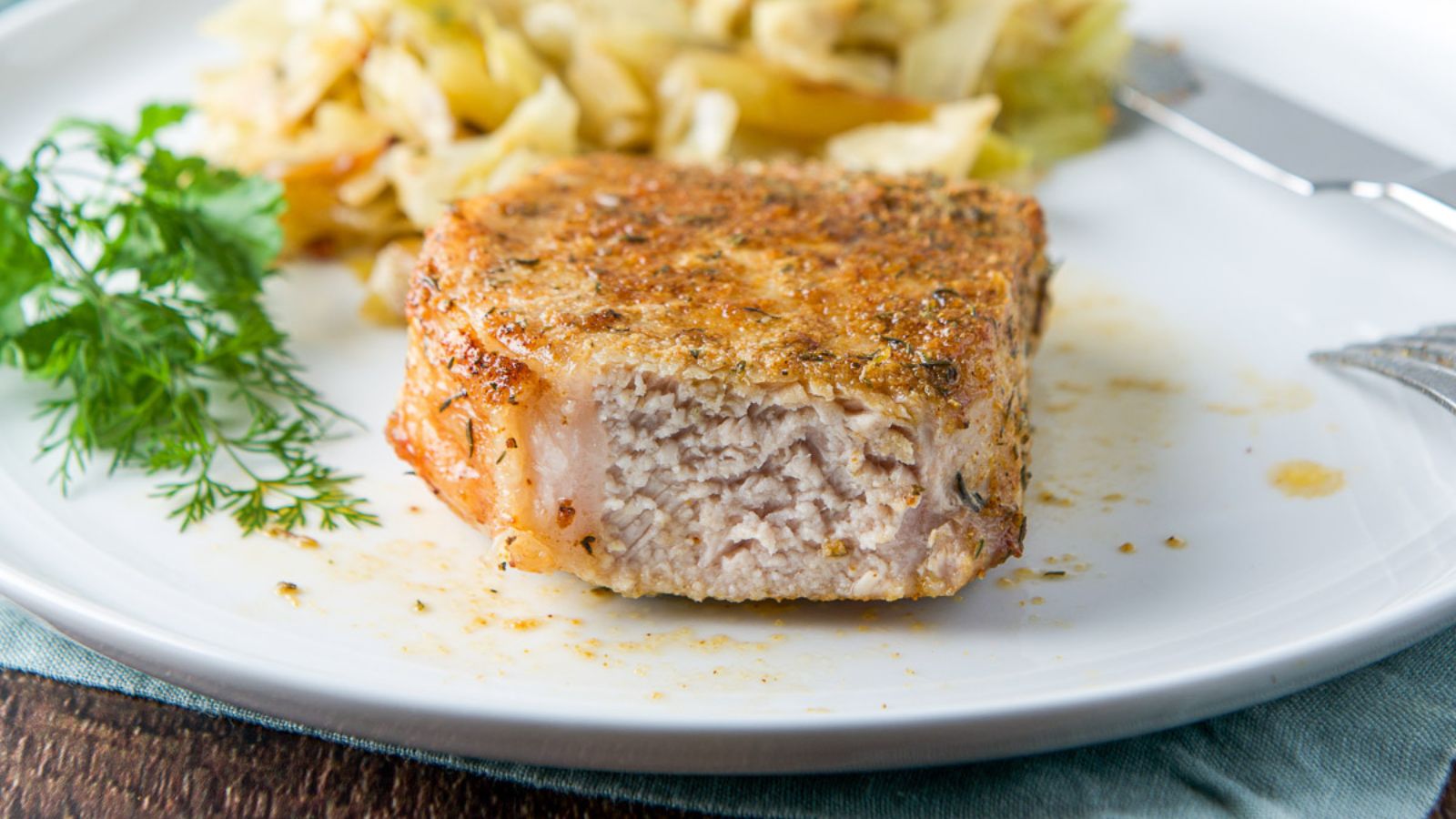 Pork Chop sliced on a plate. 
