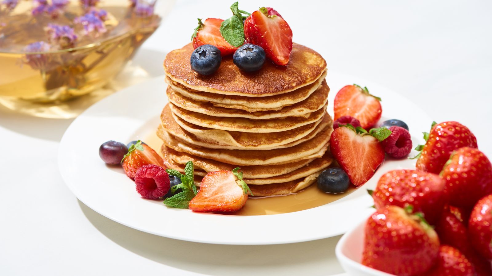 pancakes with blueberries and strawberries.