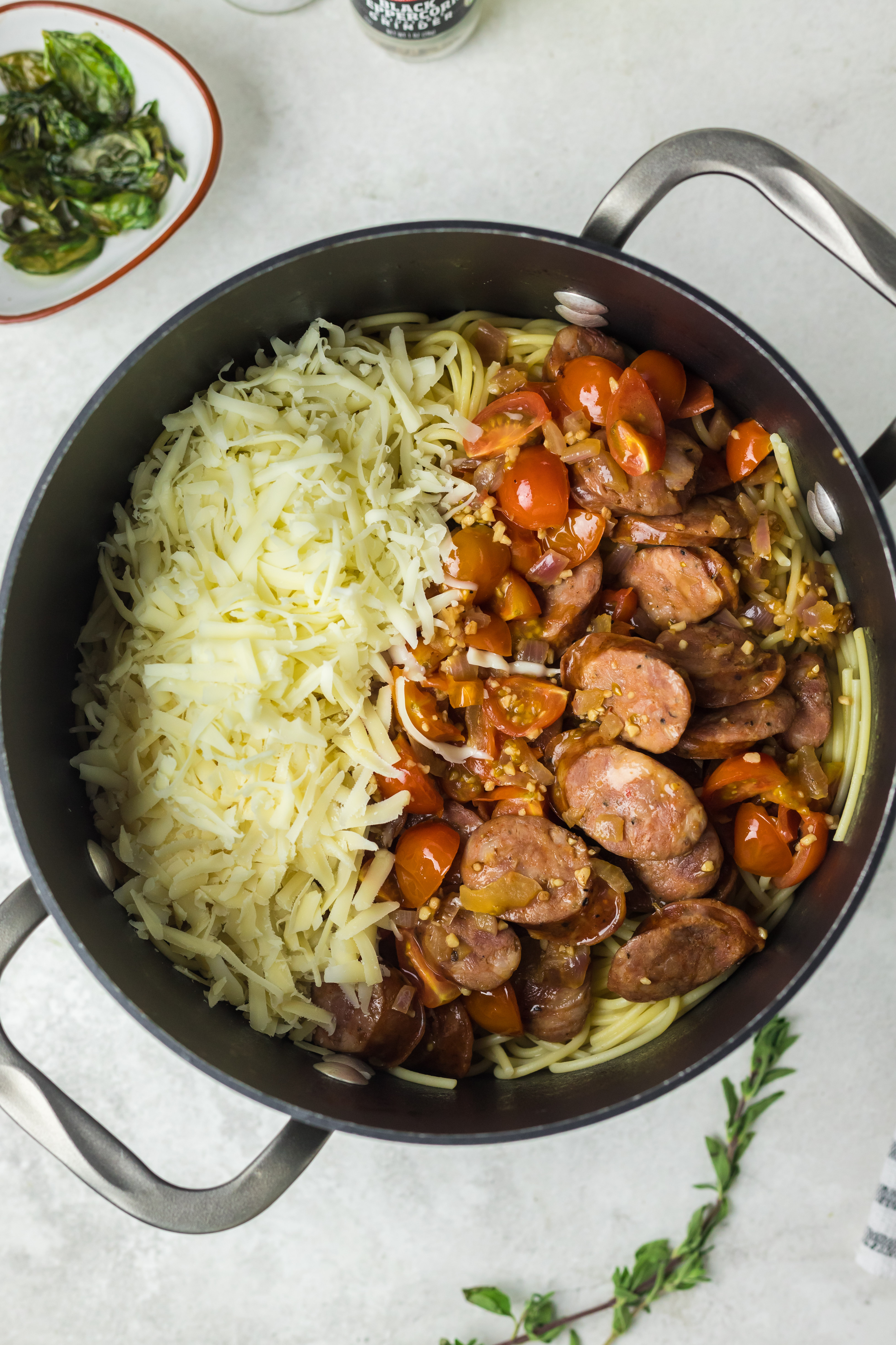 Pasta and cheese added to the chorizo mixture.