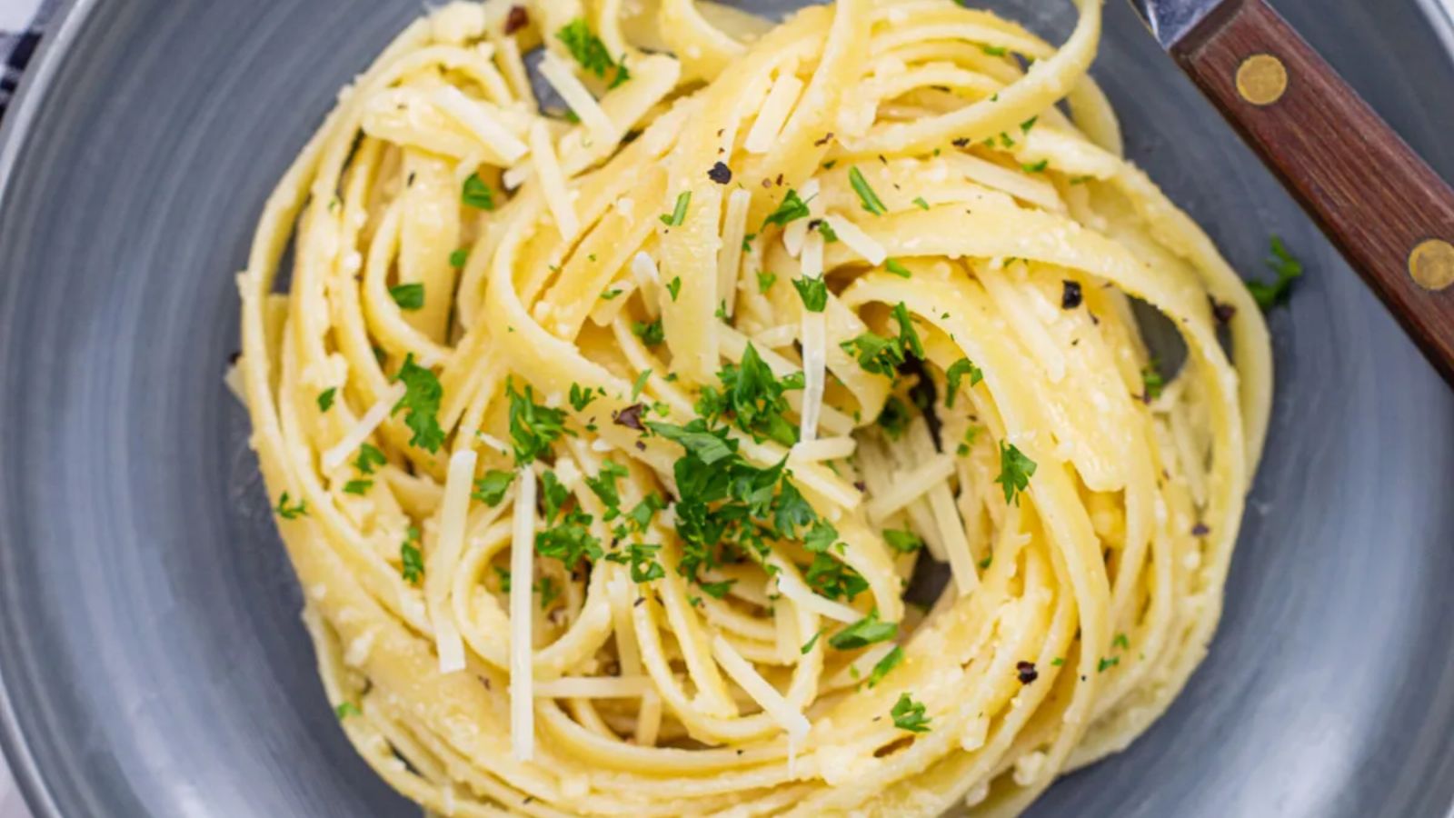 Fettuccine alfredo on a plate.