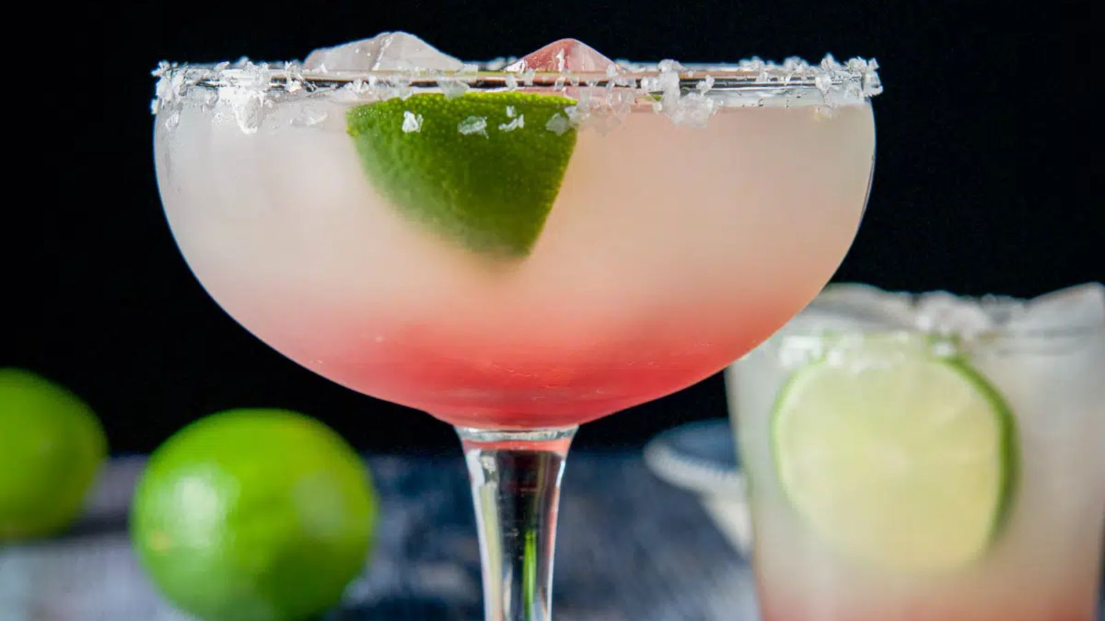 Raspberry margarita in a cocktail glass.