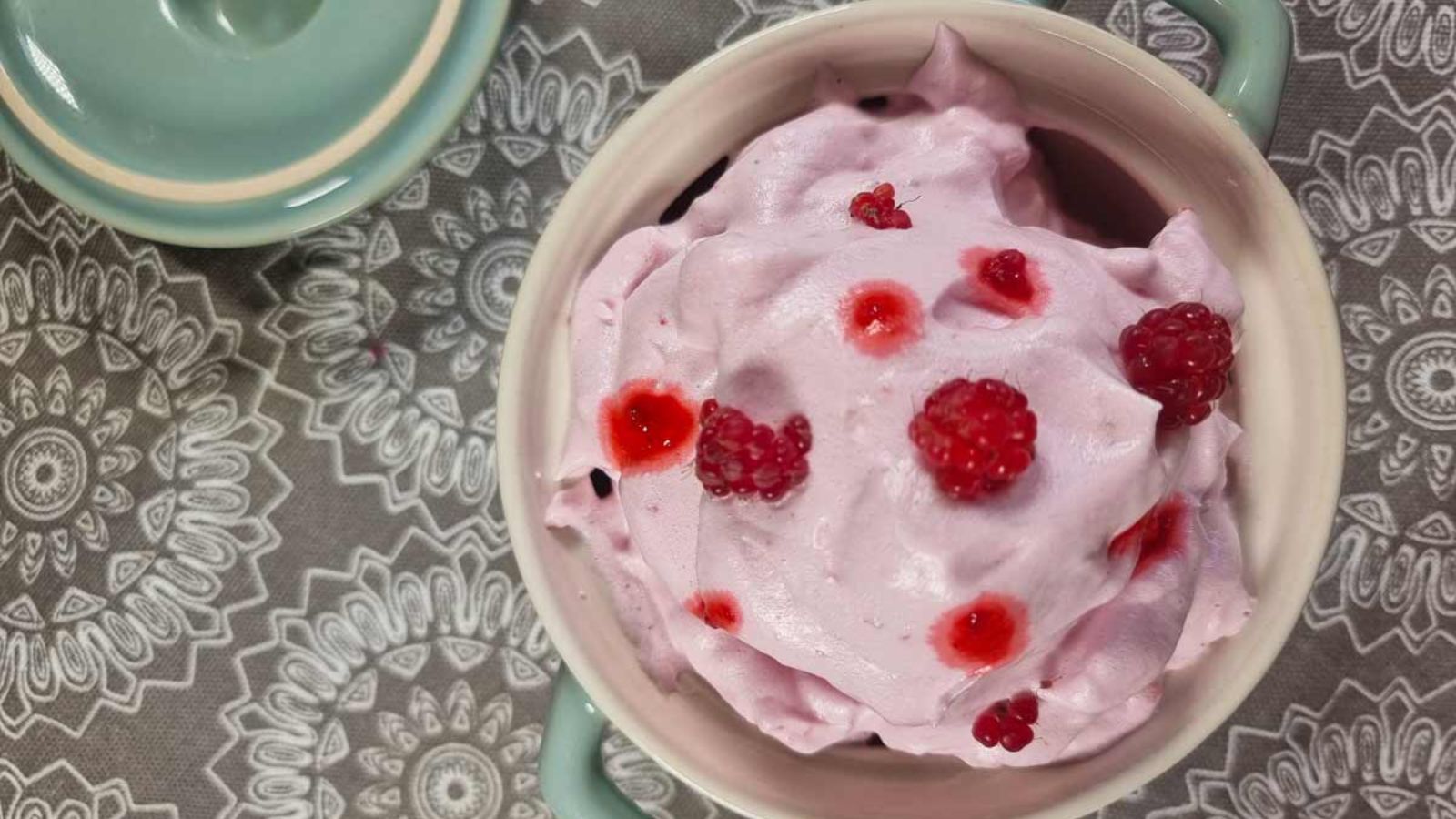 Raspberry mousse in a bowl.