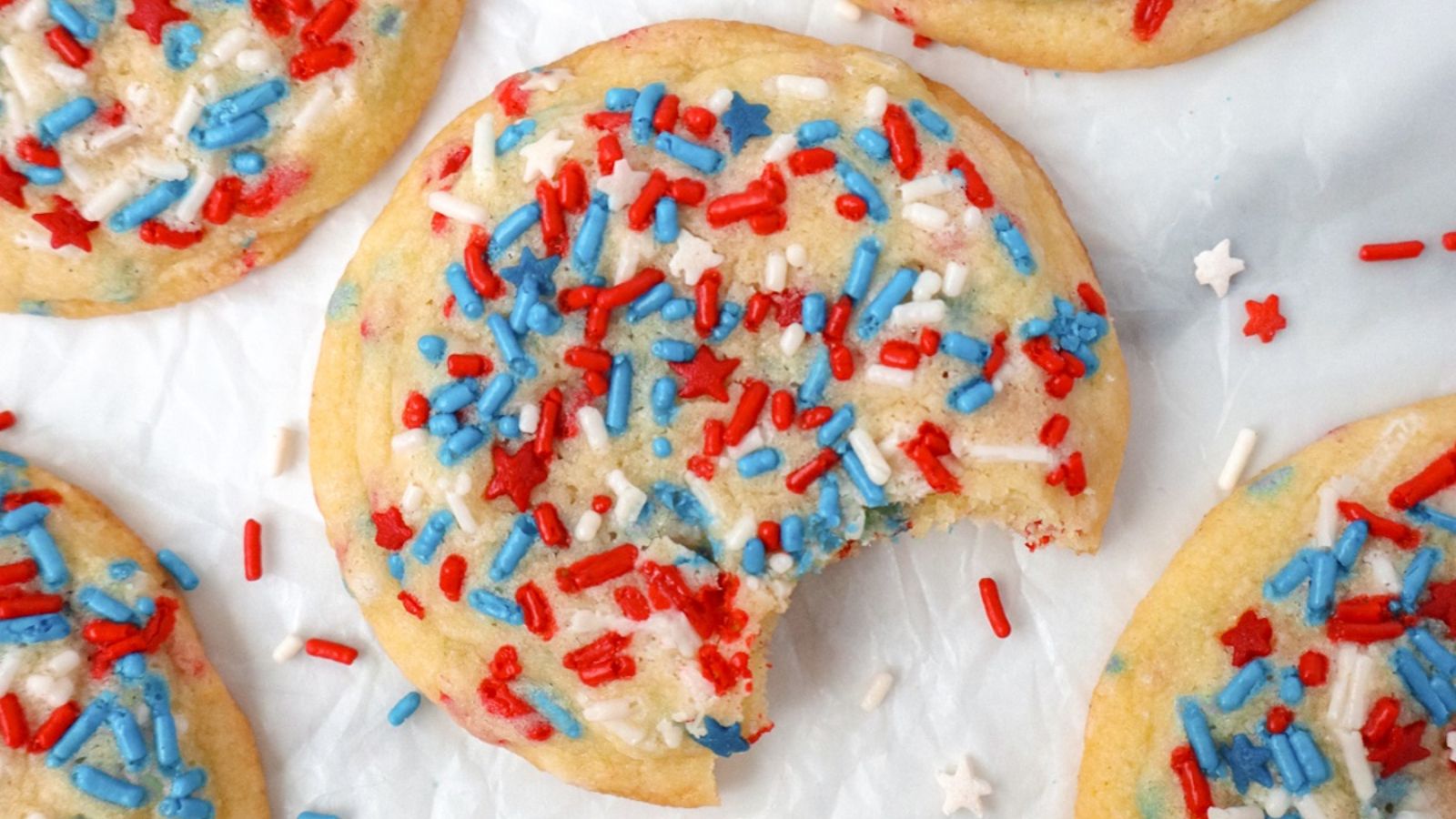 Sprinkle cookies on a parchment paper.