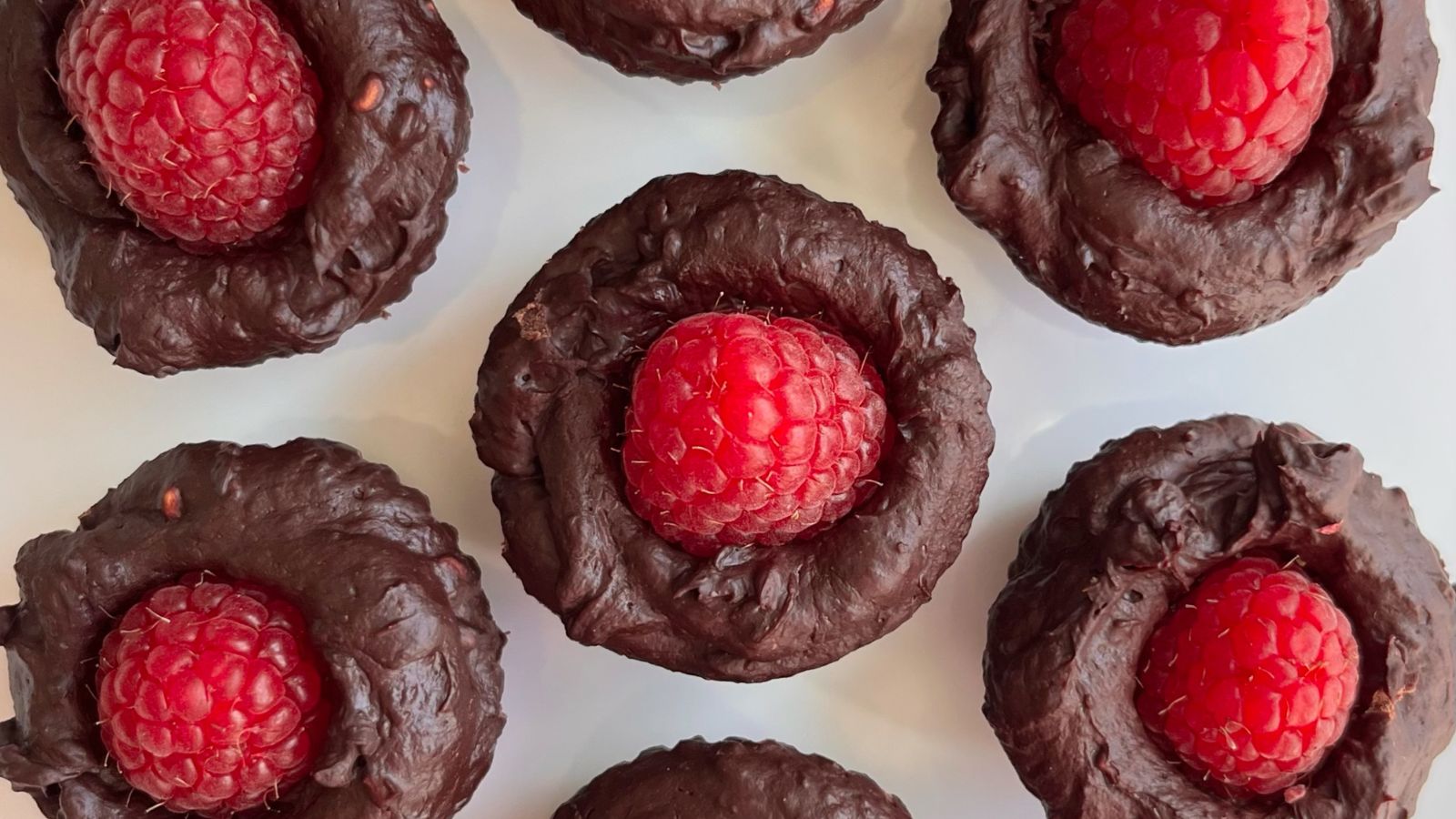 Raspberry chocolates close up shot.