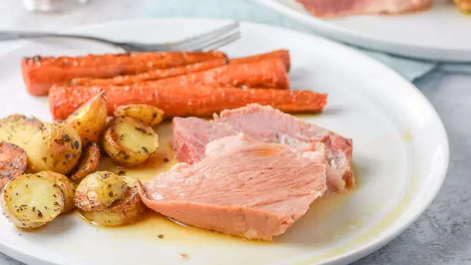 Smoked pork shoulder on a plate.