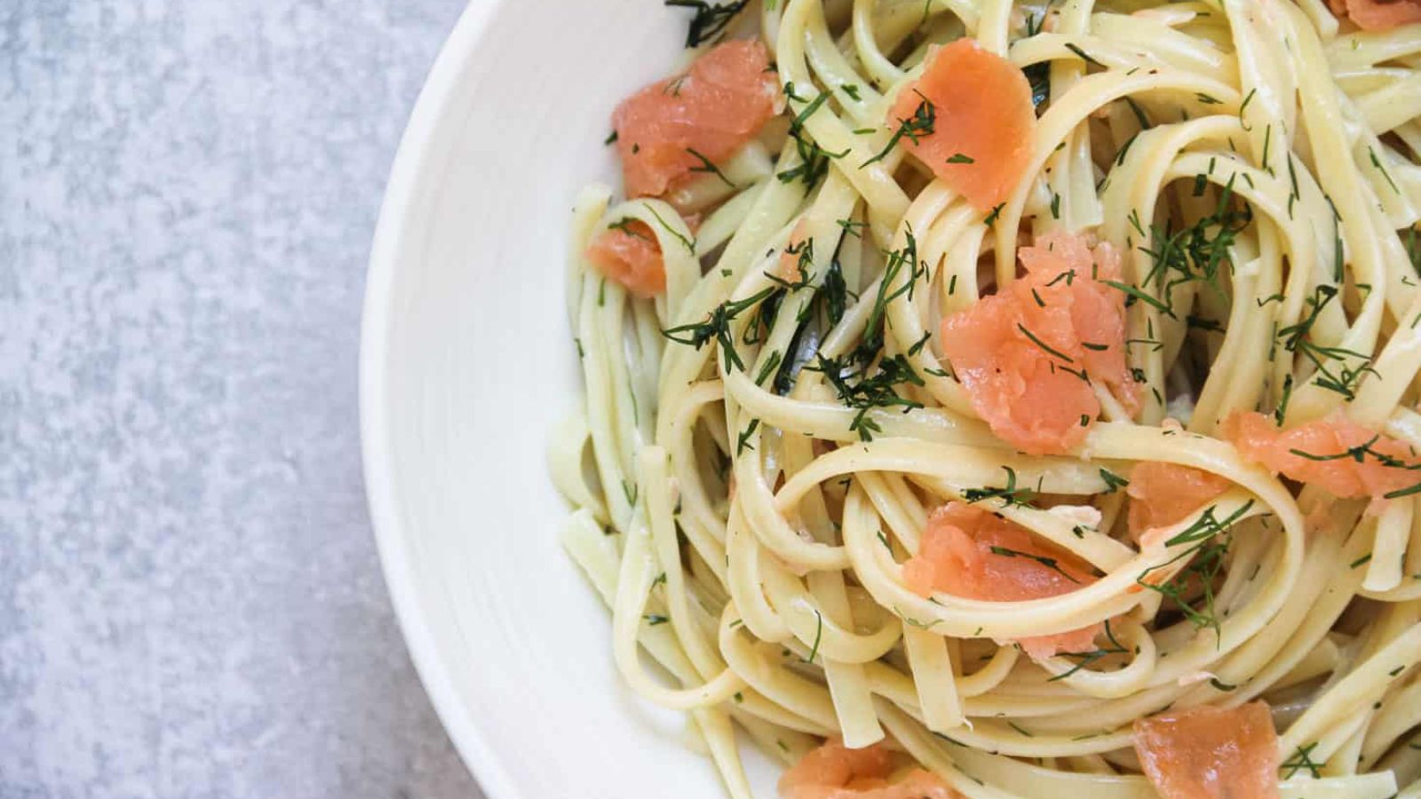 Salmon pasta on a plate.