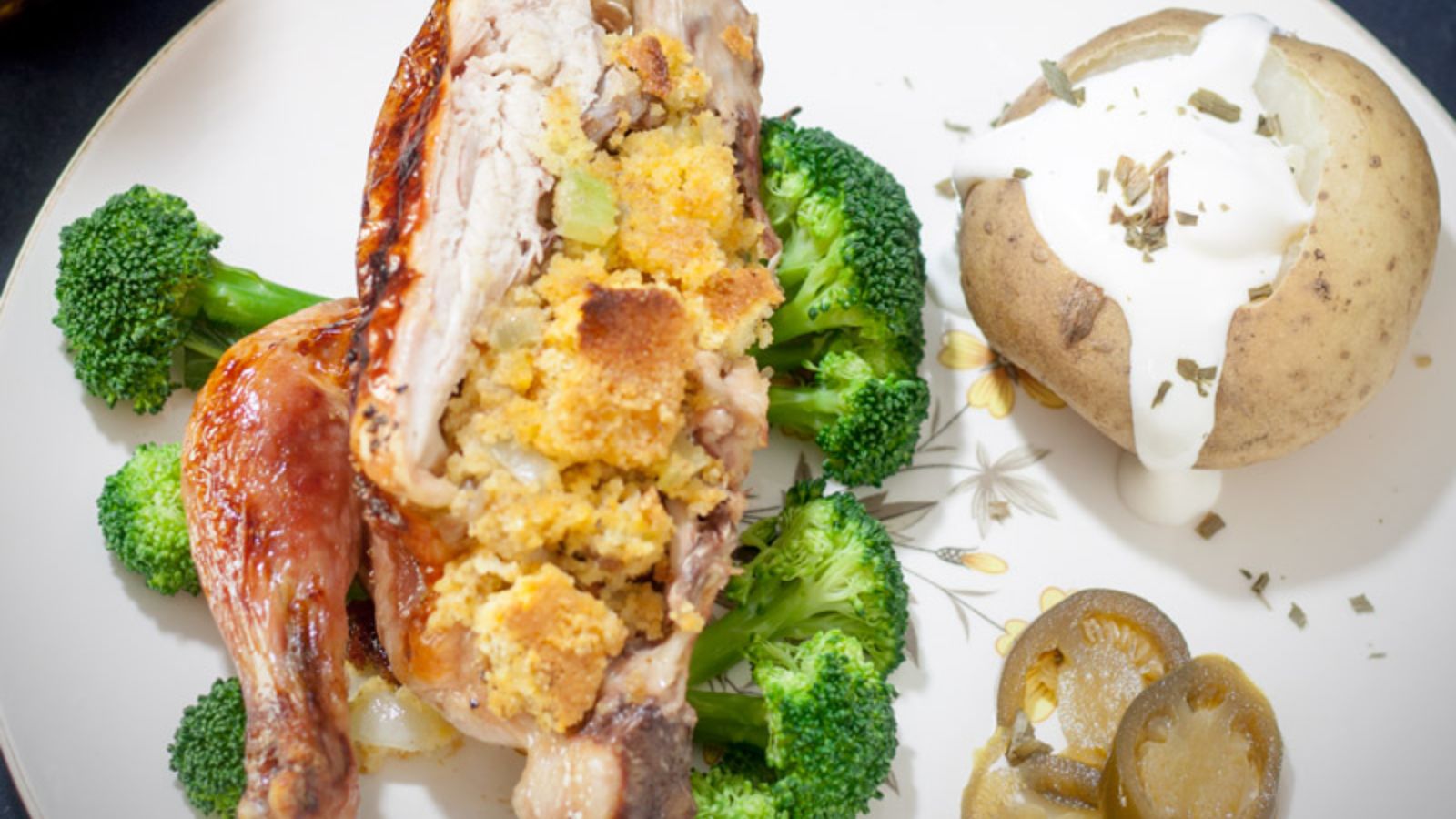 Chicken with cornbread and sausage stuffing.