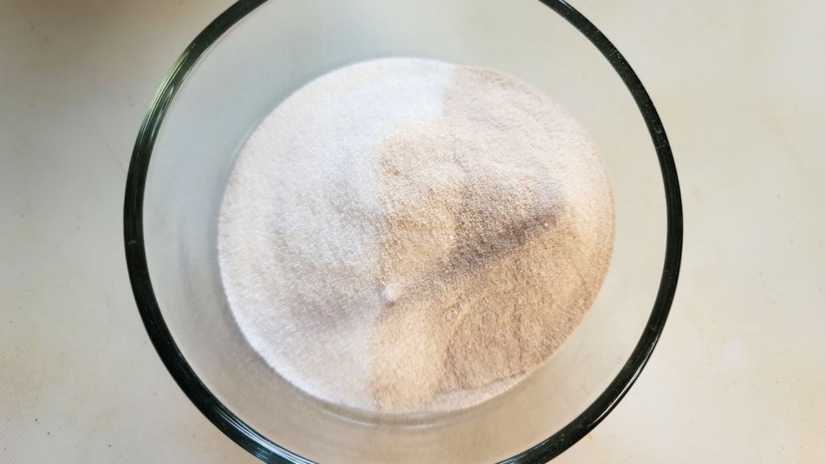 Pectin and sugar added to a small bowl.