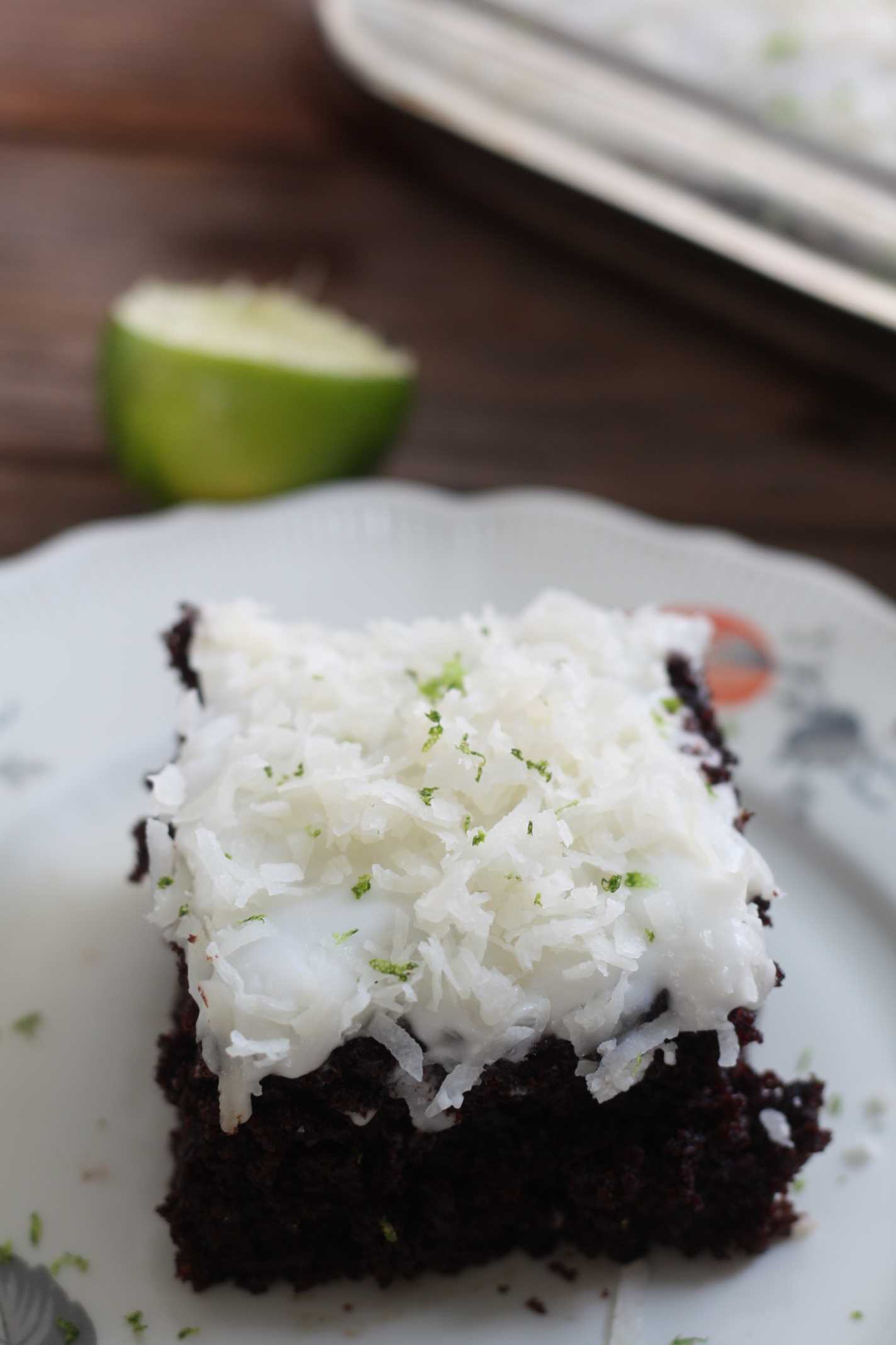 slice of Chocolate Cake topped with coconut and lime zest