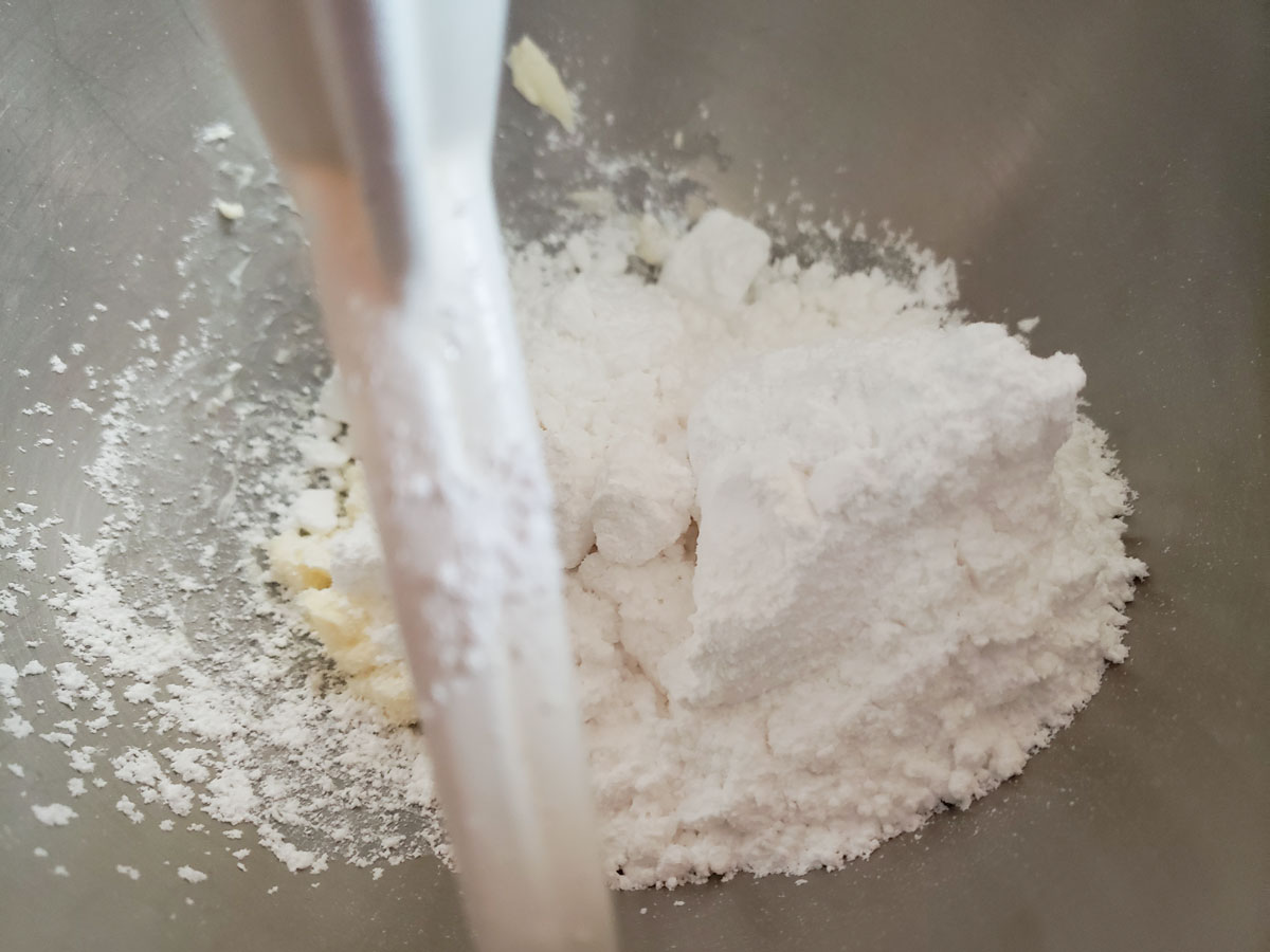 Butter and powdered sugar in a board.