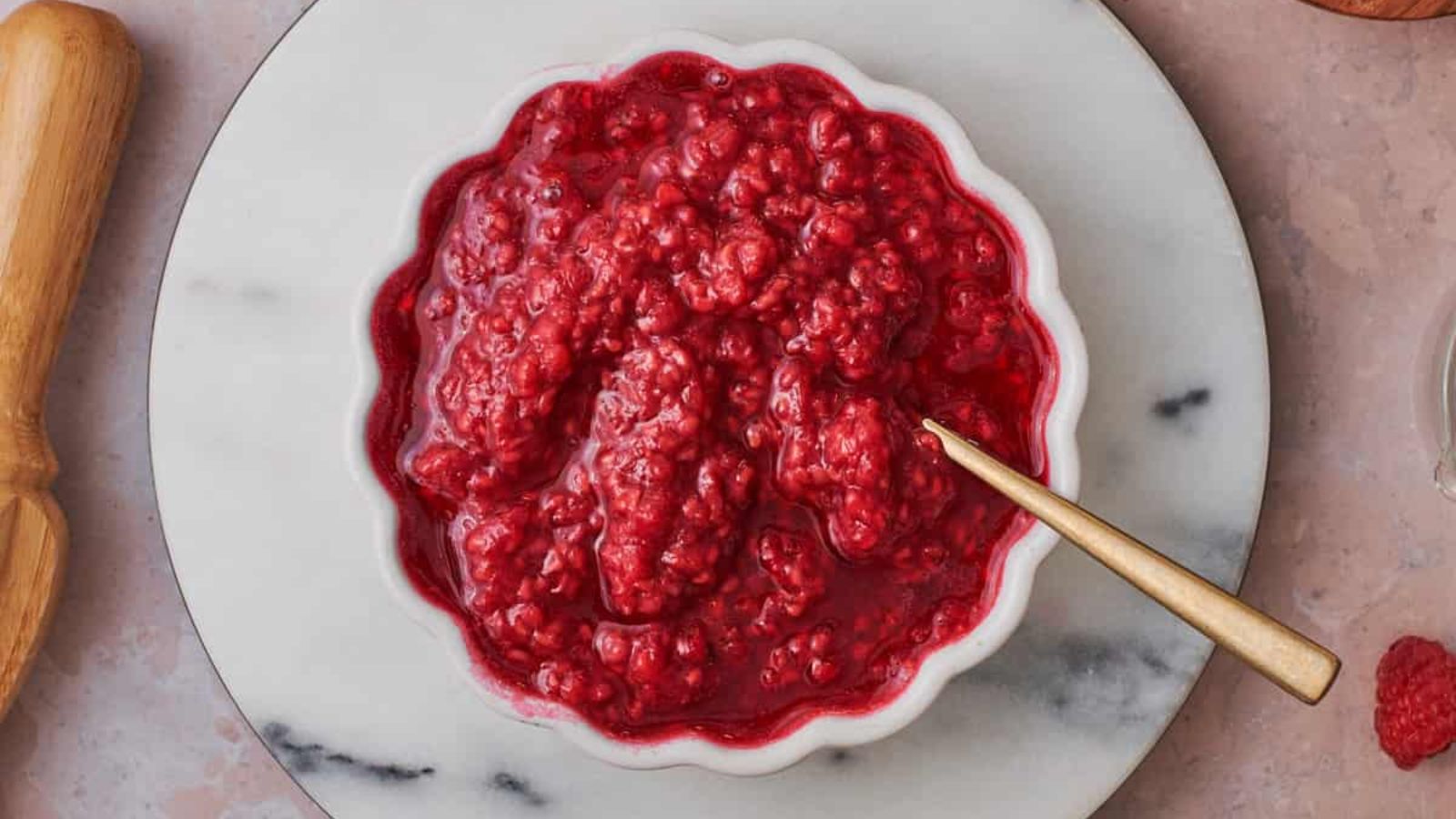 Raspberry compote in a bowl.