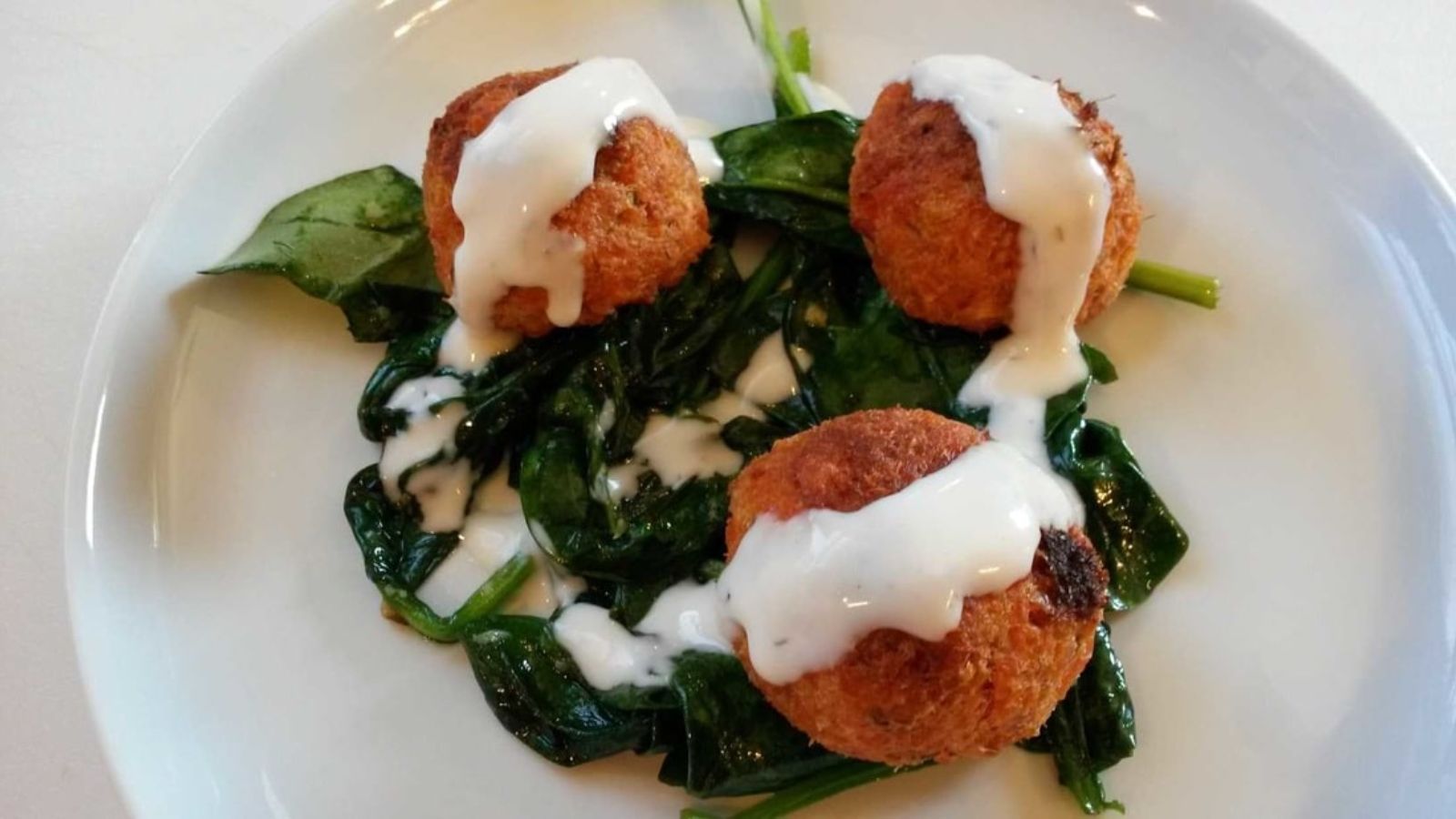 Salmon balls on a plate.