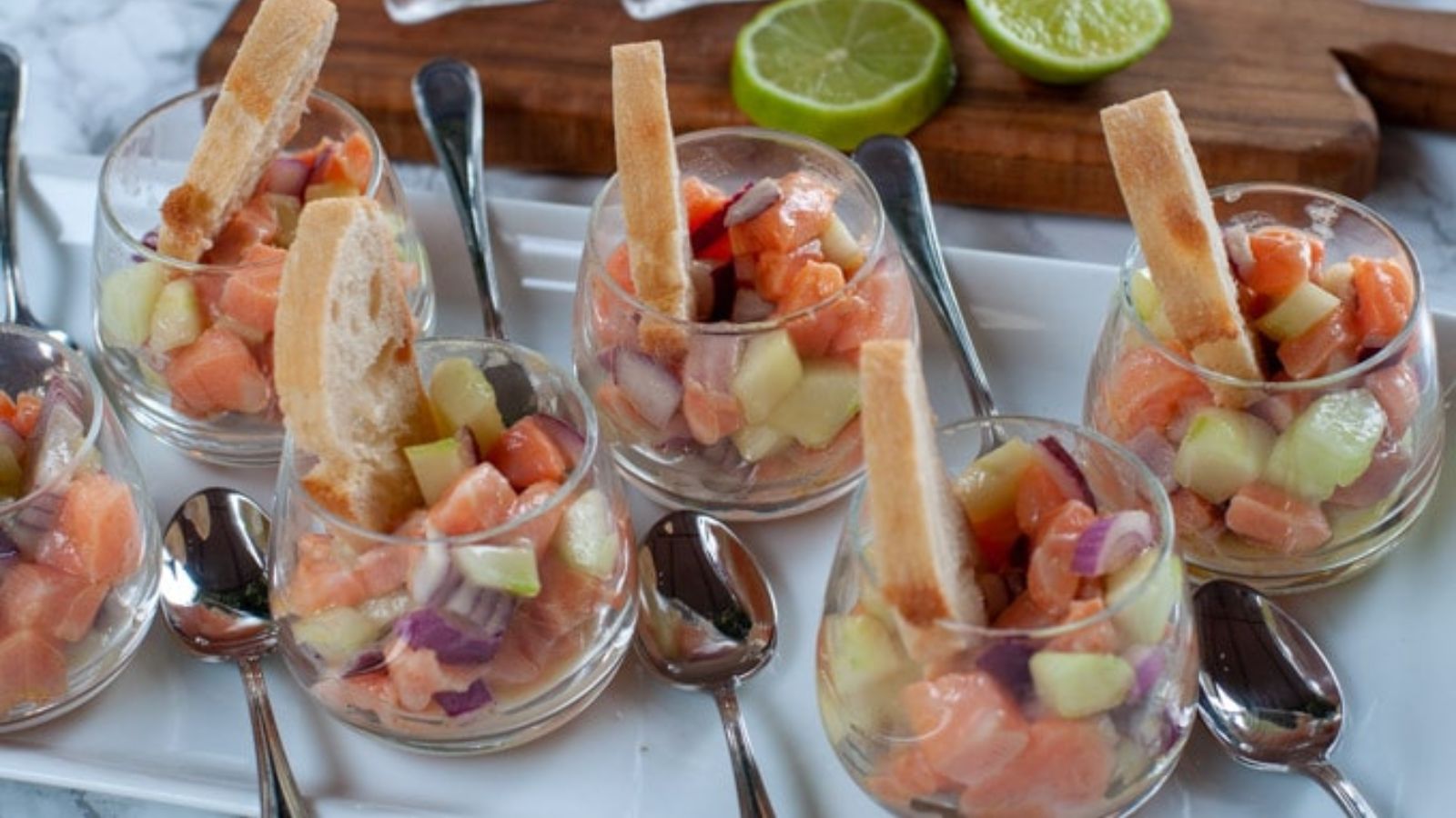 Salmon tartare in glasses.