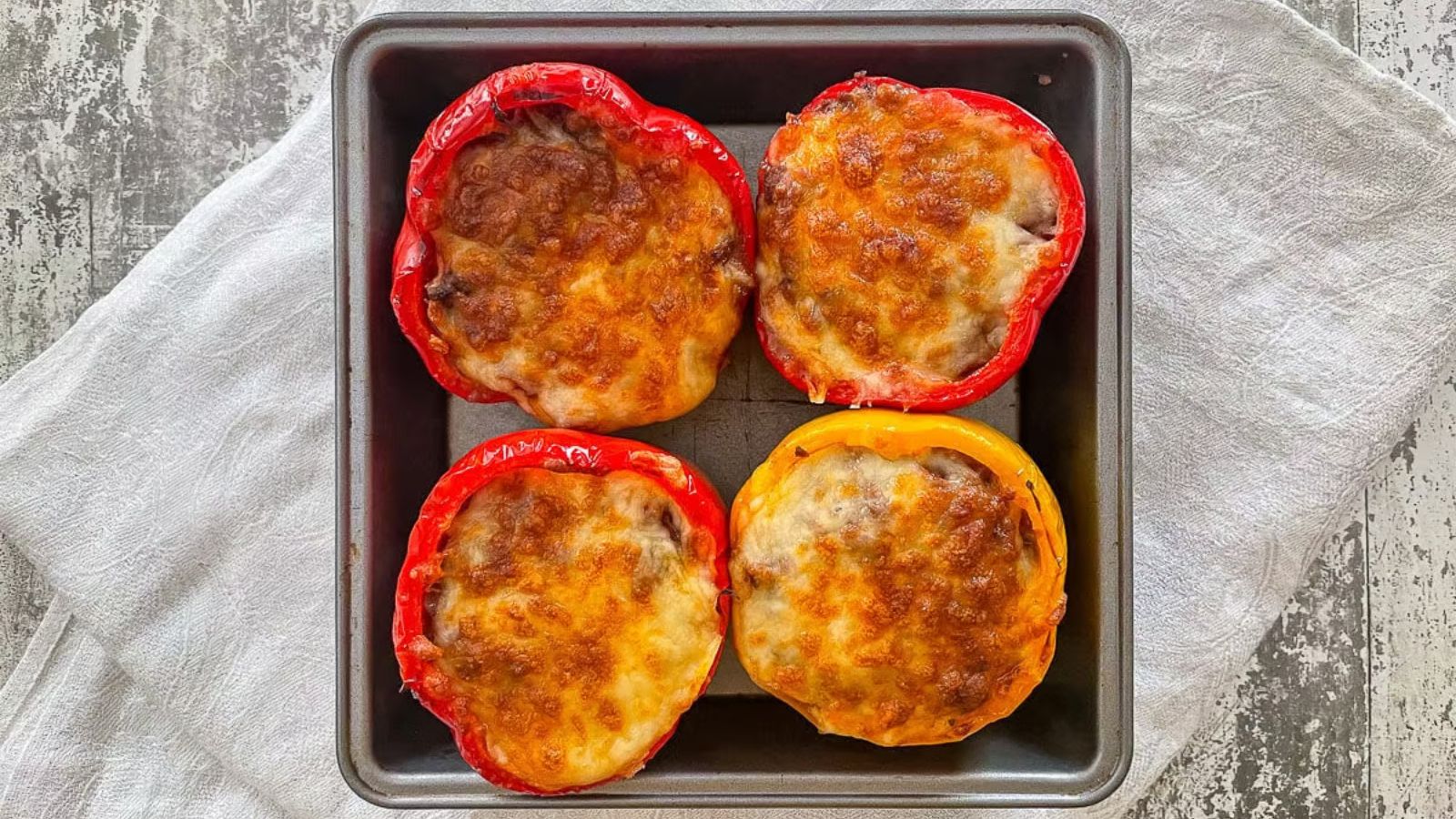 Stuffed peppers on a tray.