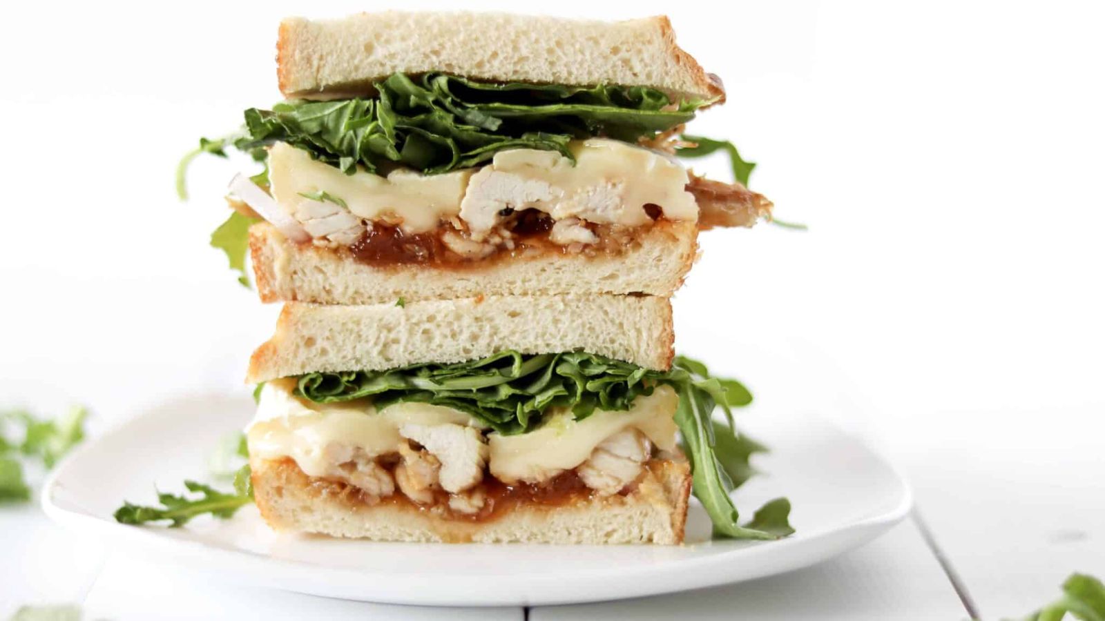 Chicken sandwich on a plate.