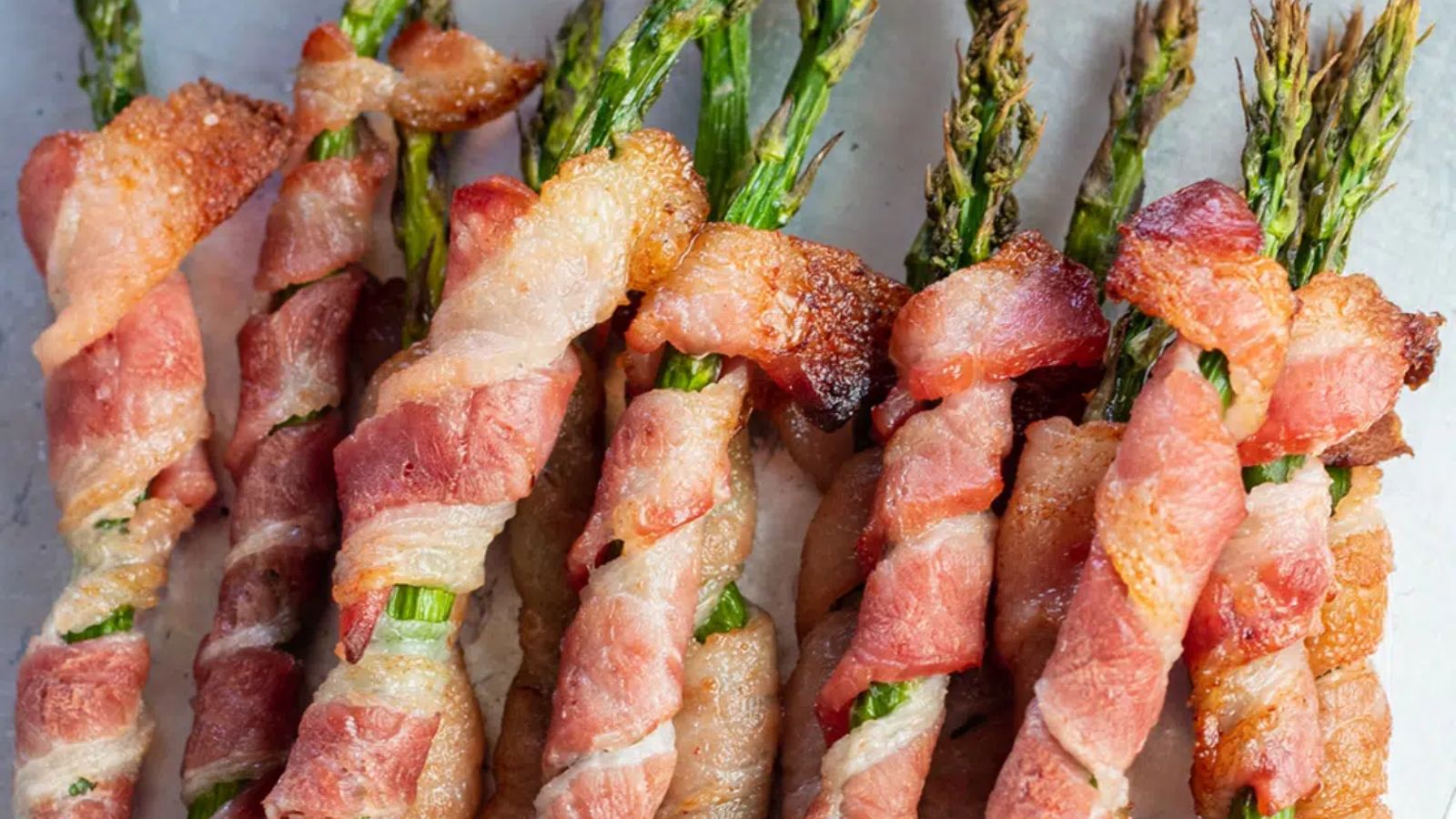 Asparagus wrapped with bacon.