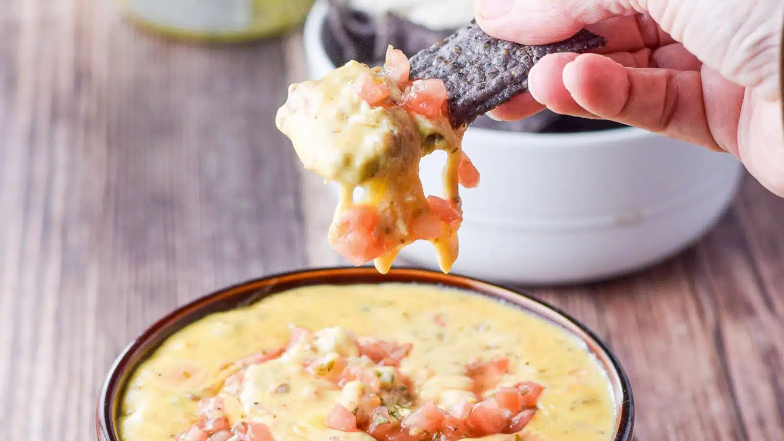 Queso dip in a bowl.