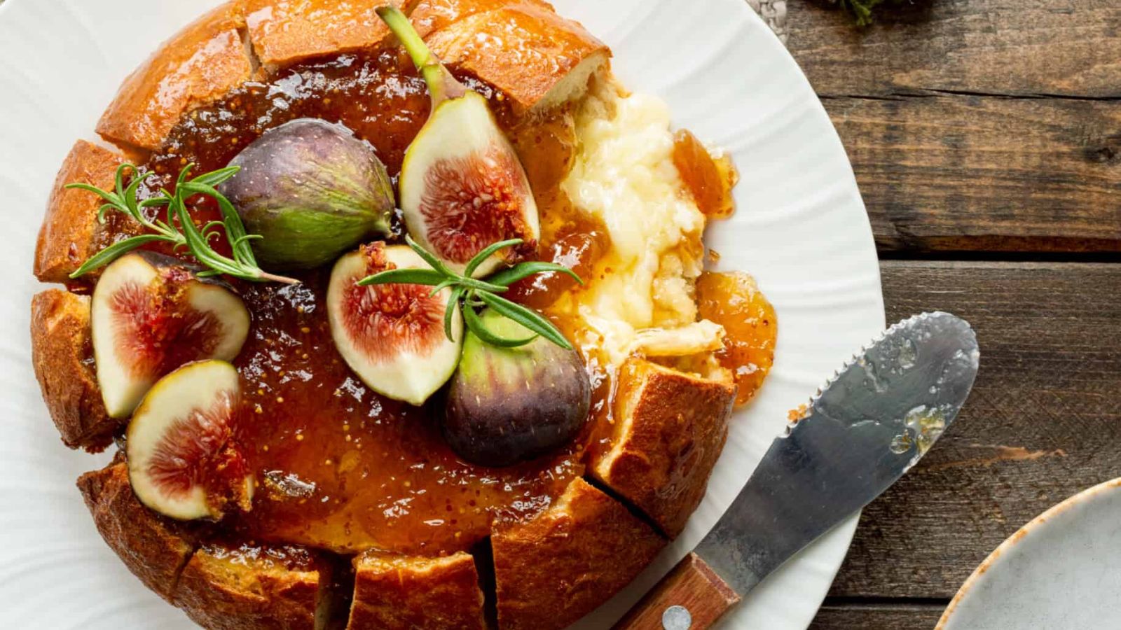 Bread bowl with baked brie and fig.